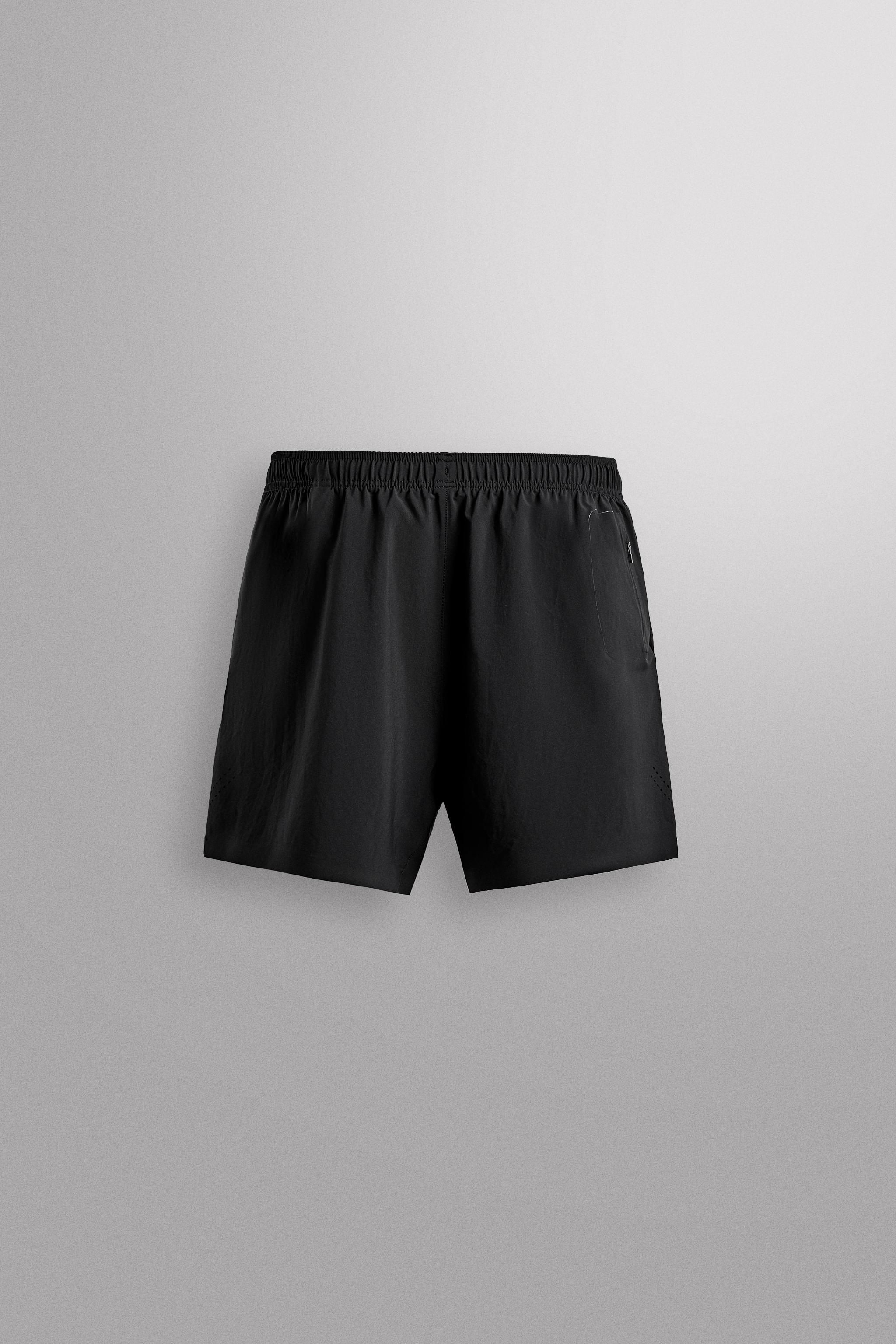 LIGHTWEIGHT PERFORATED SHORTS