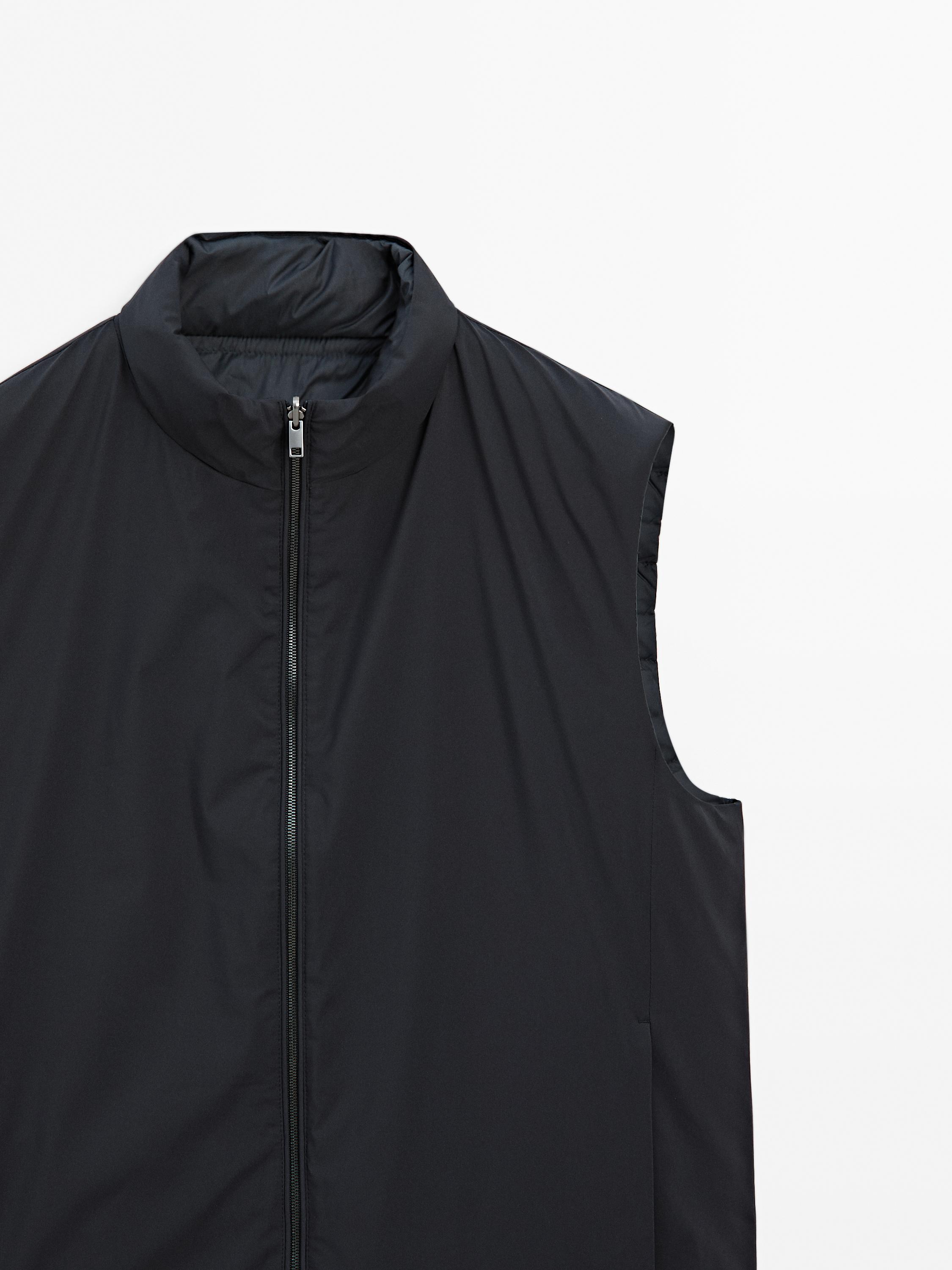 Water-repellent reversible down blend gilet
