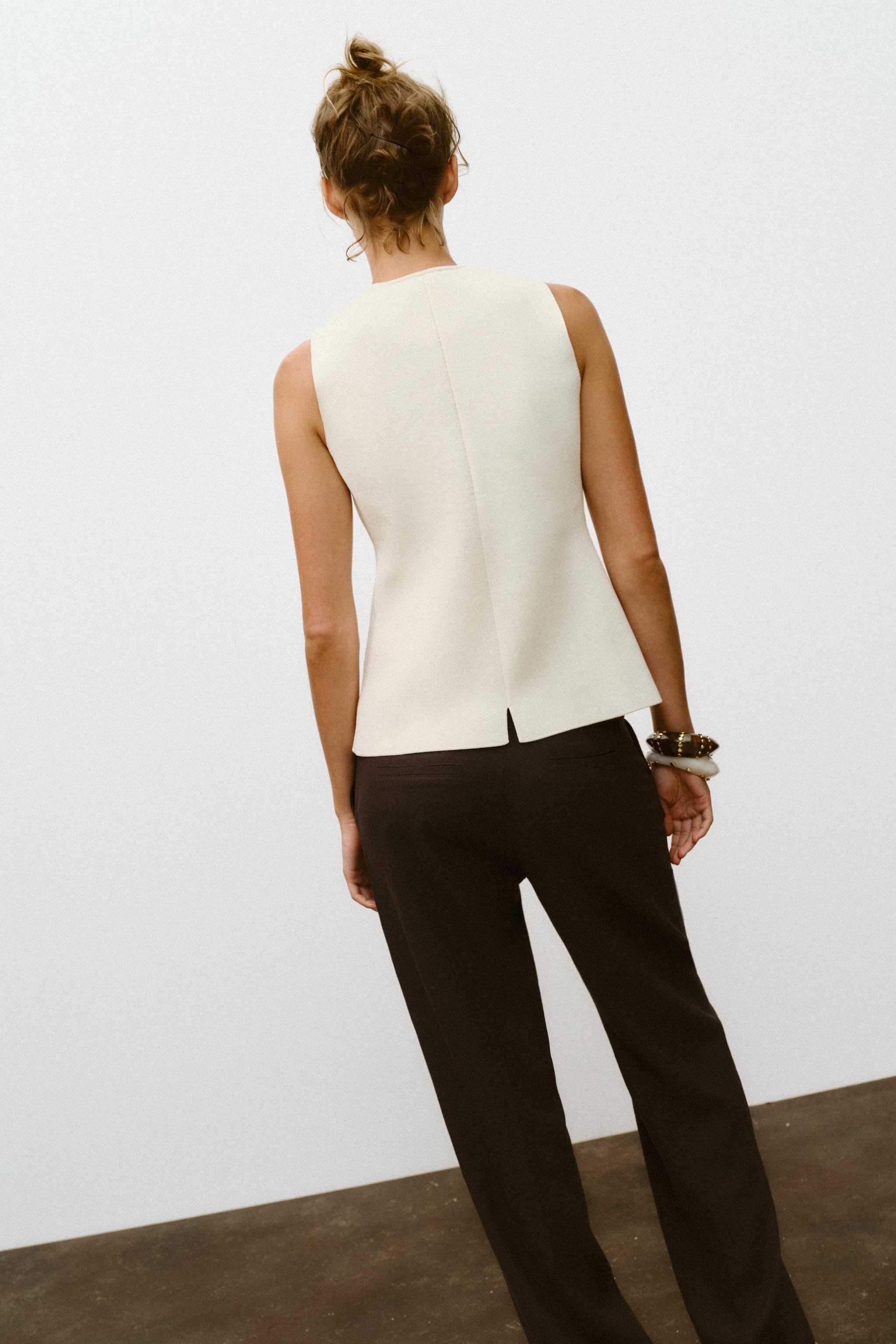 COVERED BUTTON KNIT VEST