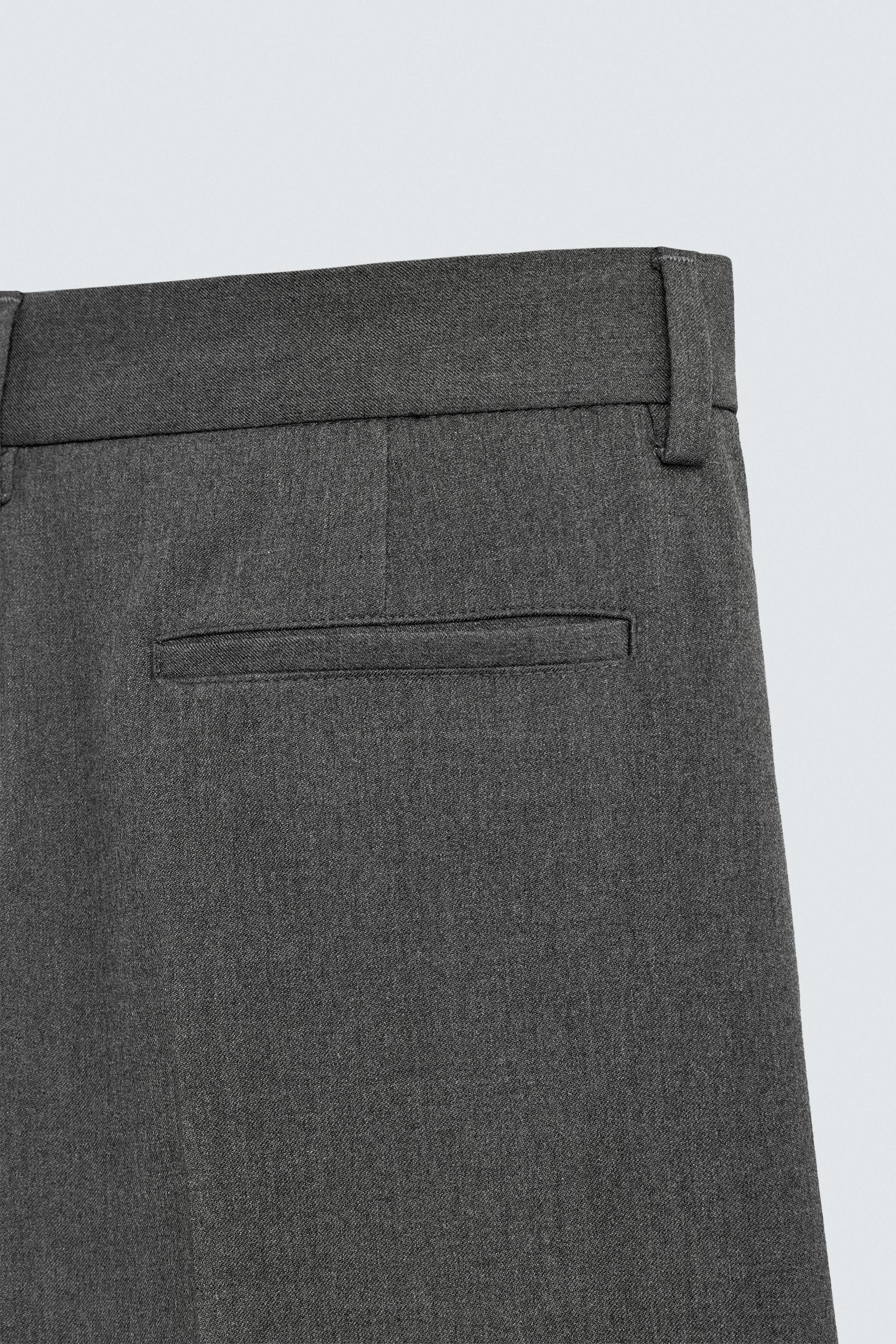 PLEATED WIDE FIT PANTS