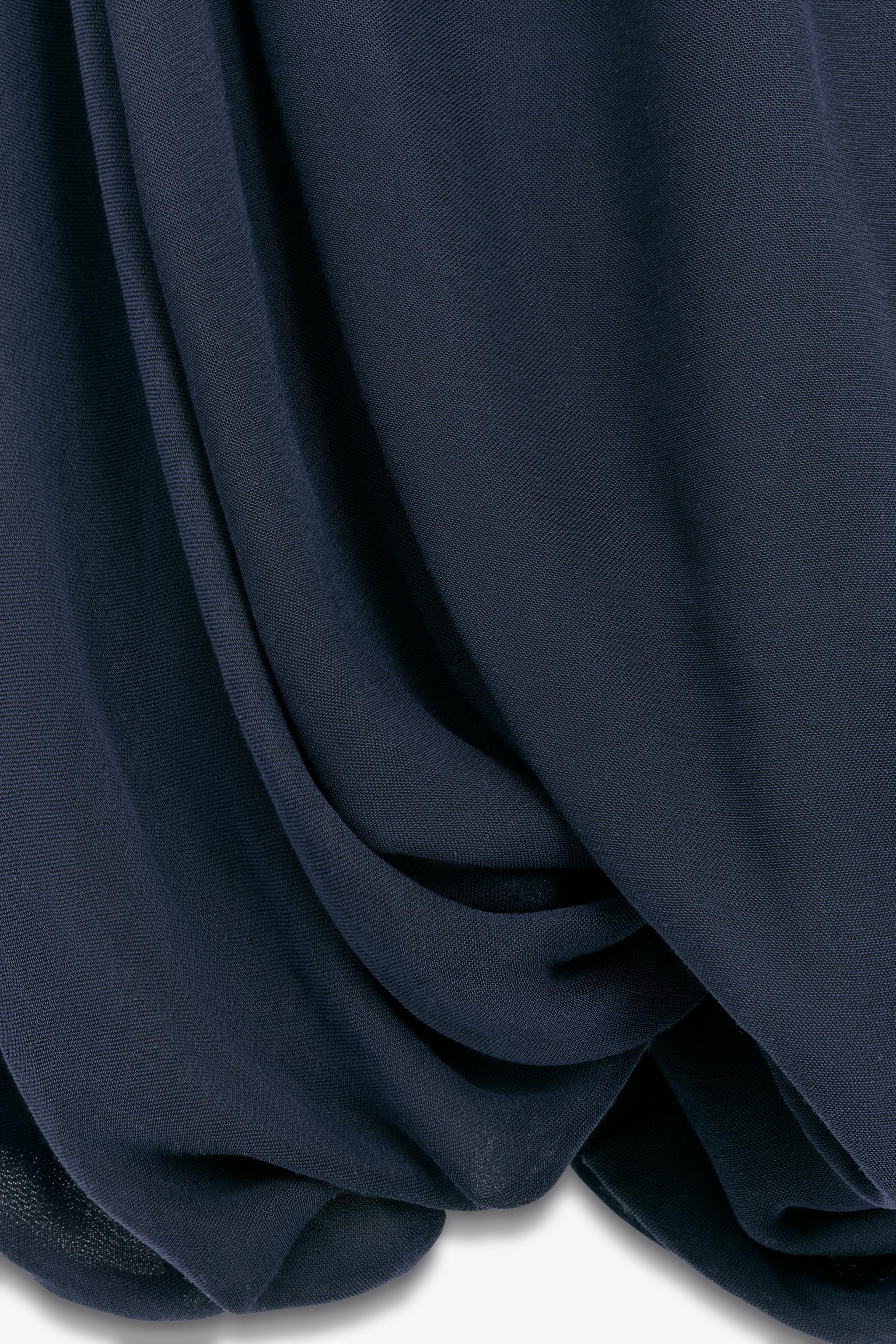 LIMITED EDITION HALTER DRESS WITH VOLUMINOUS HEM