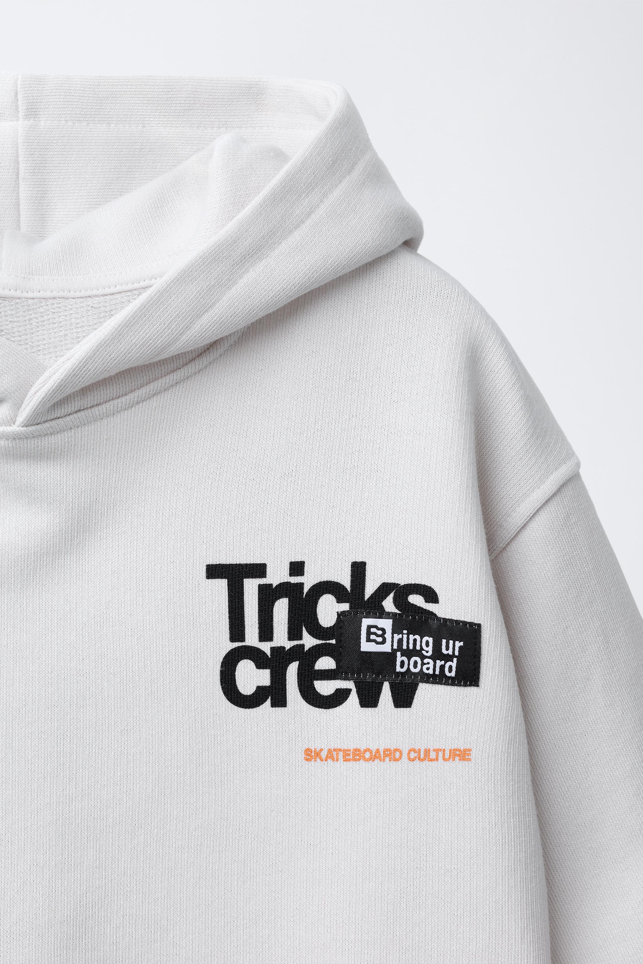 SHORT SLEEVE TEXT SWEATSHIRT