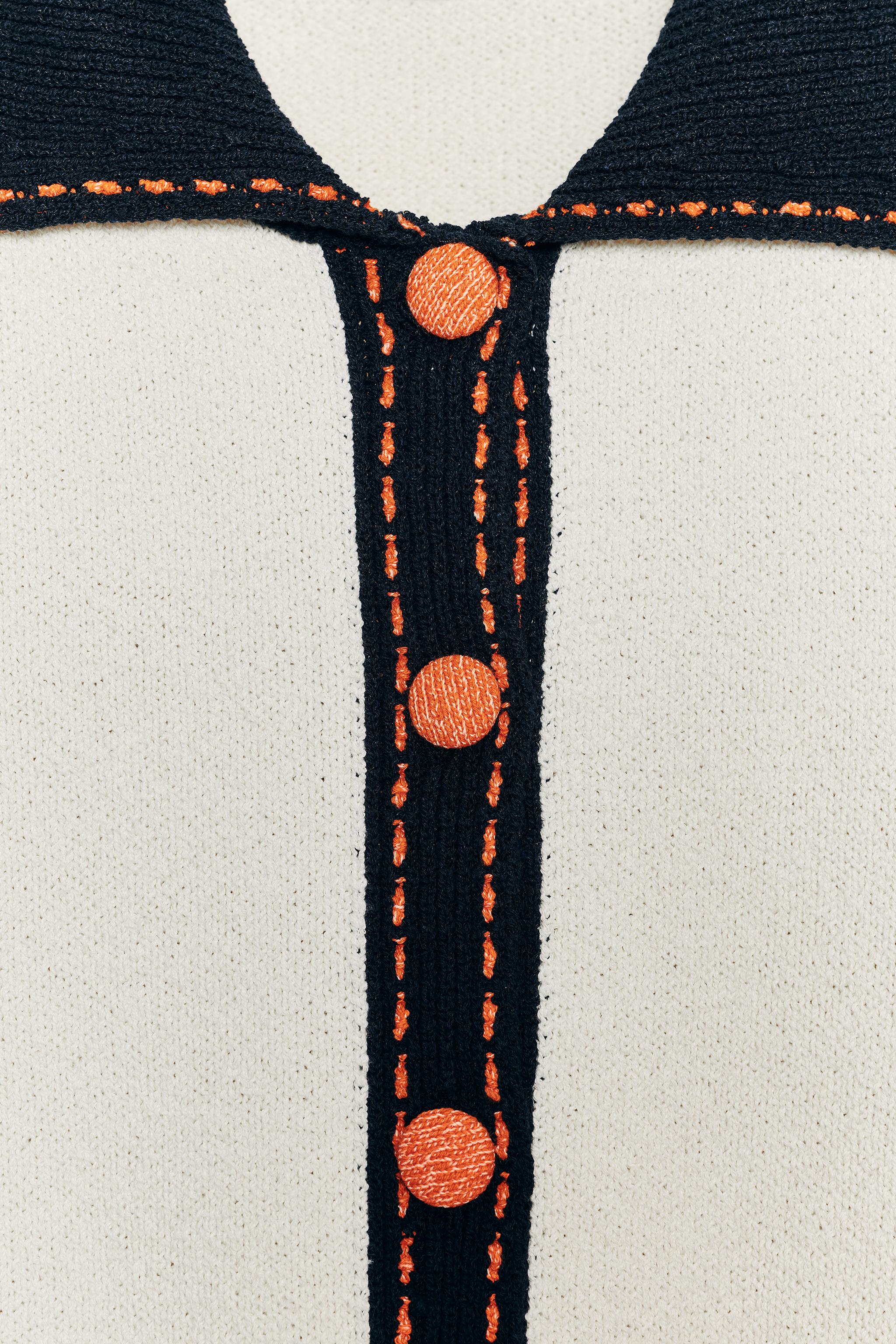 SHORT SLEEVE STITCHED KNIT CARDIGAN