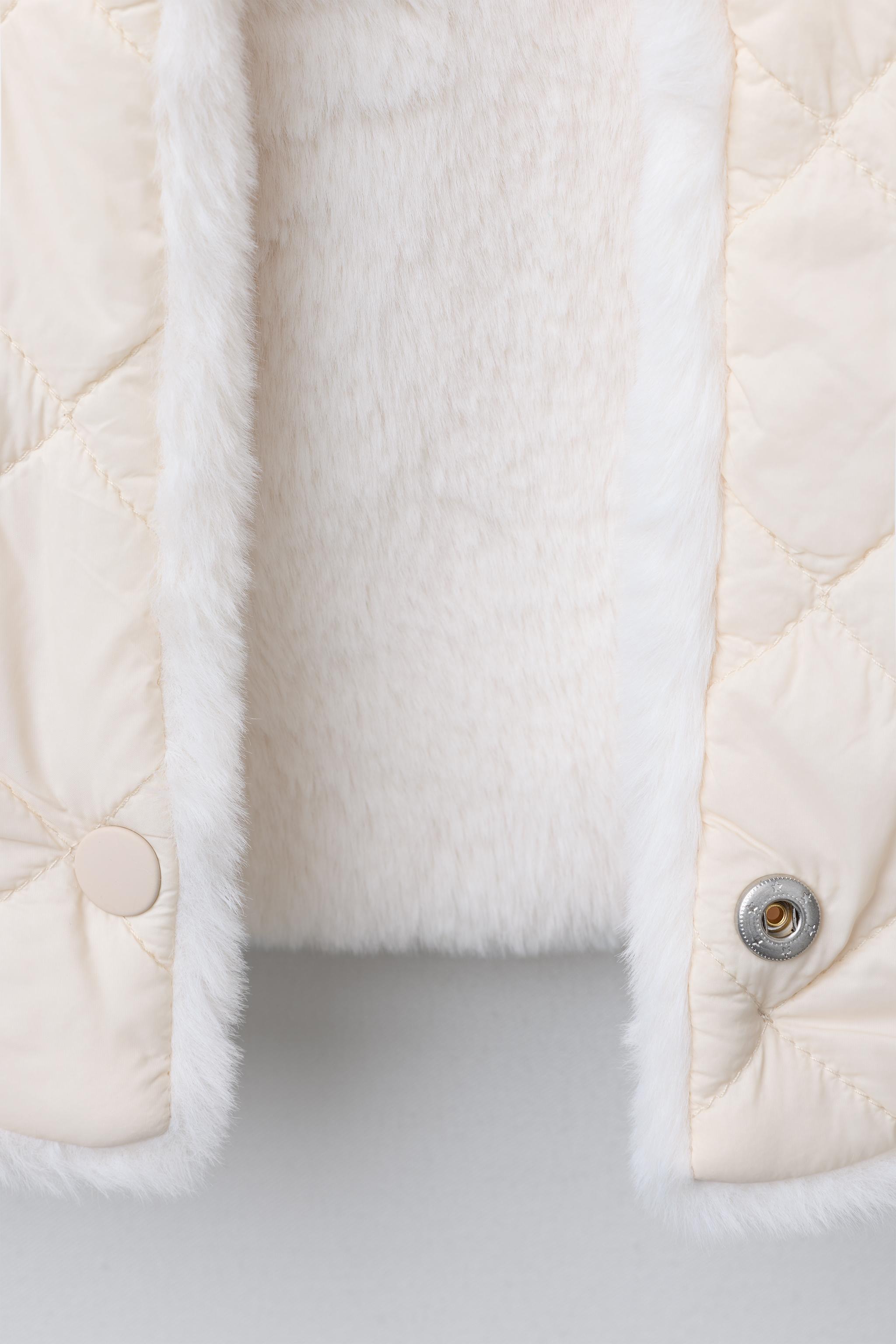 REVERSIBLE FAUX FUR VEST