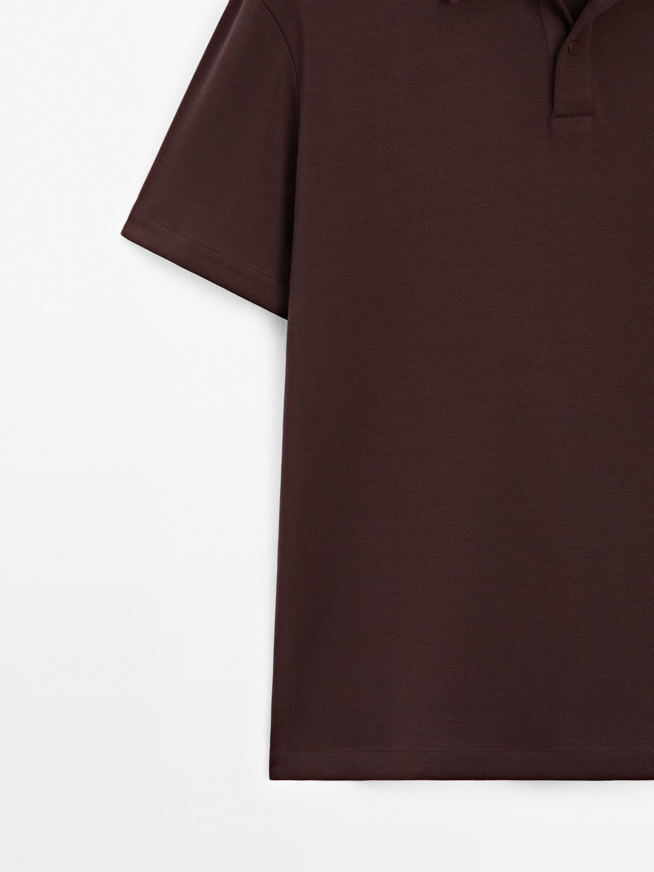 Short sleeve polo shirt with snap-button placket