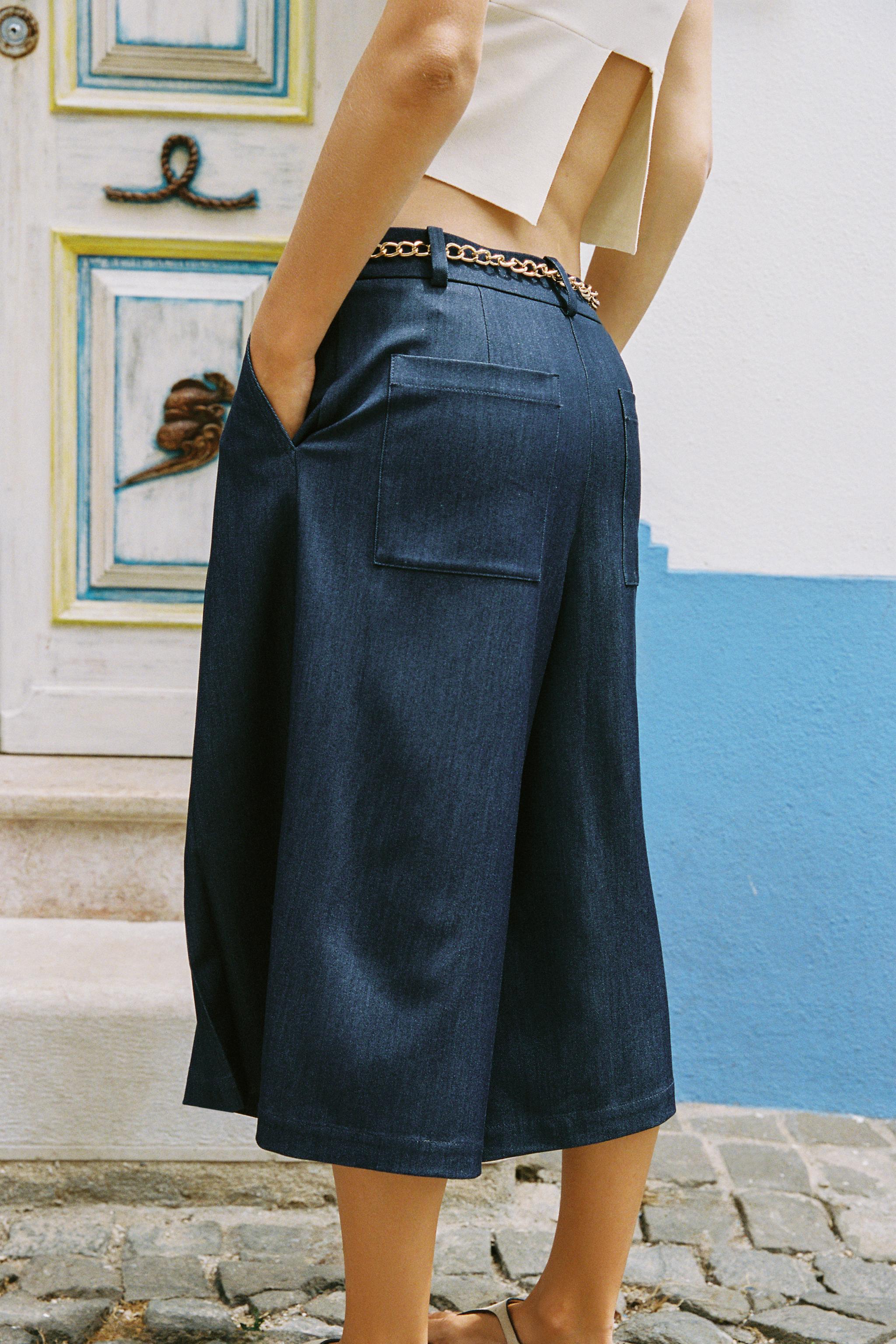 BELTED CHAIN LONG SHORTS