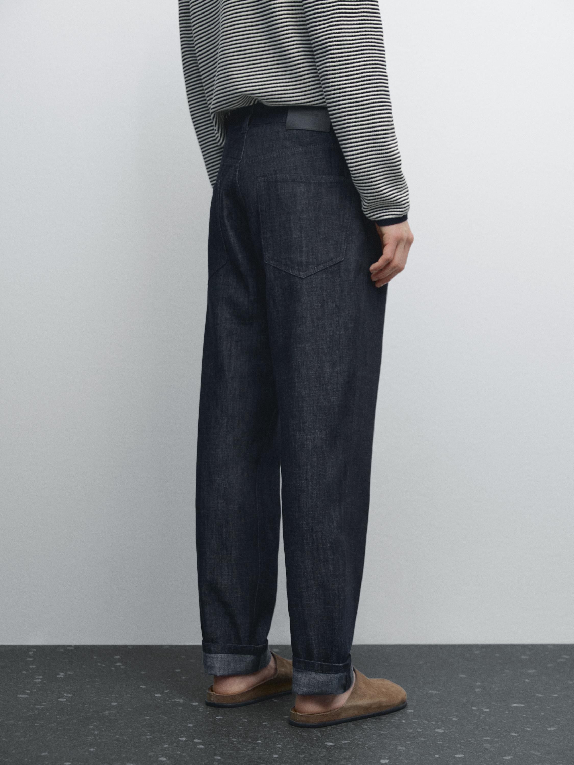 Cotton blend tapered fit jeans