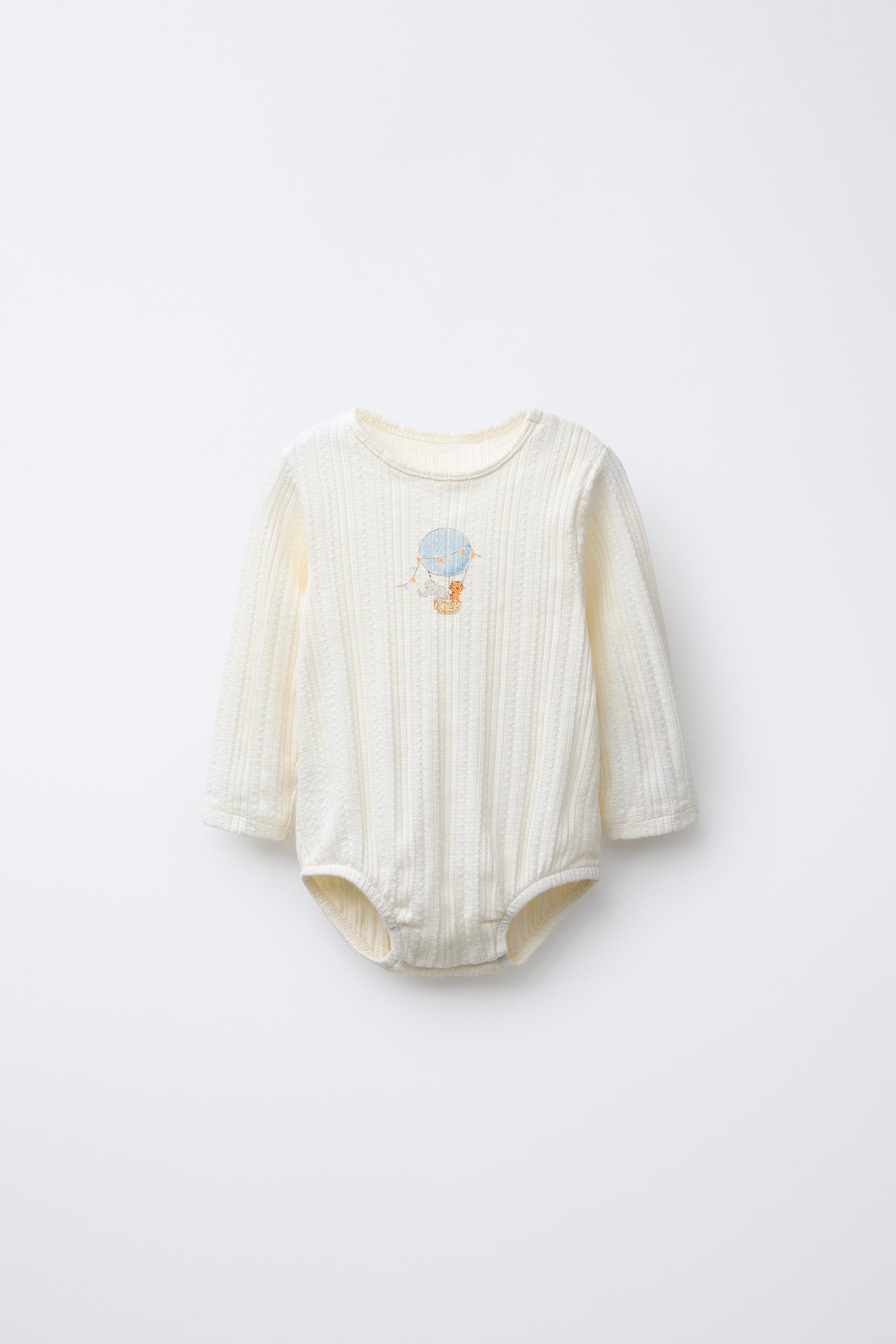 PRINTED POINTELLE BODYSUIT