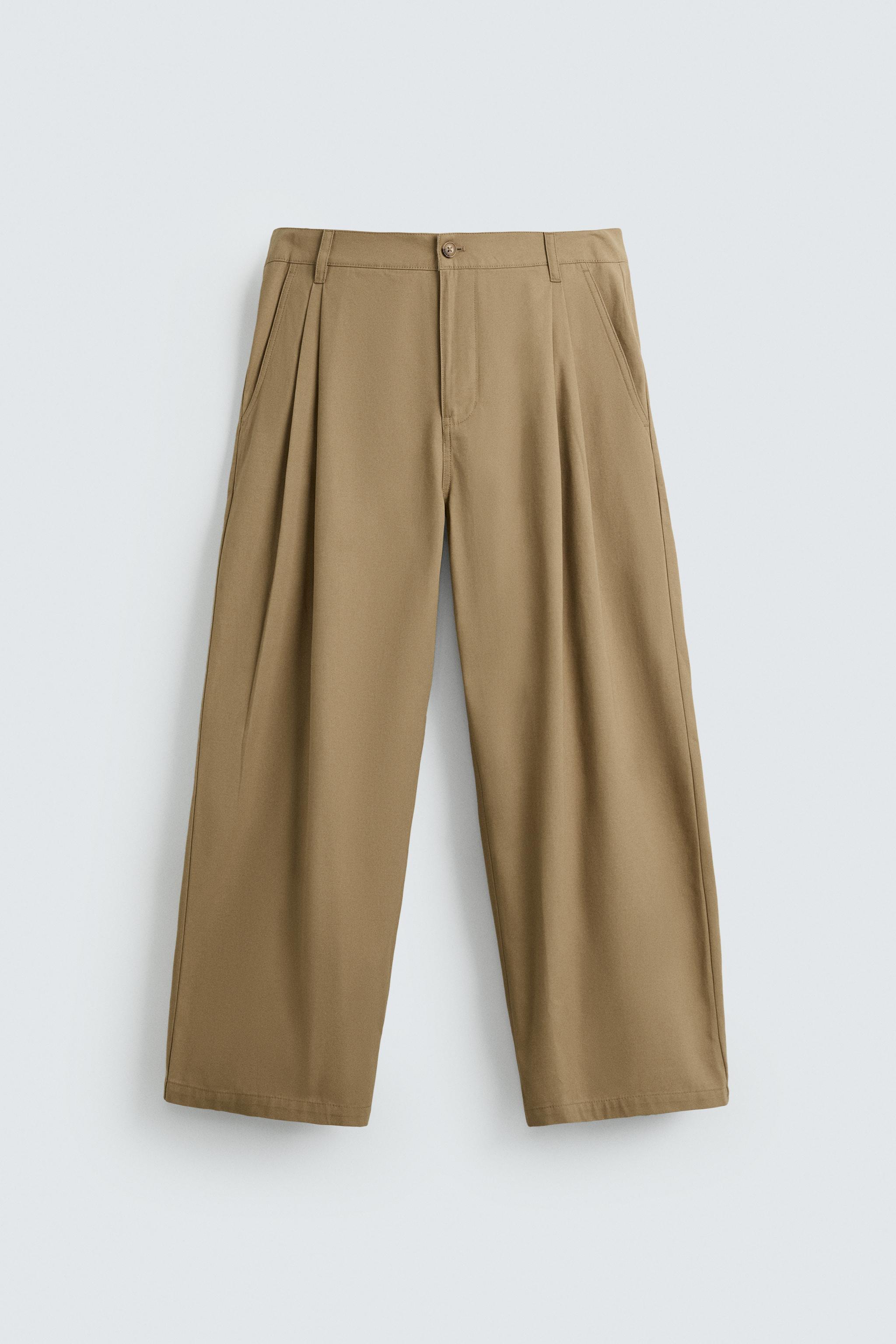 PLEATED WIDE FIT PANTS