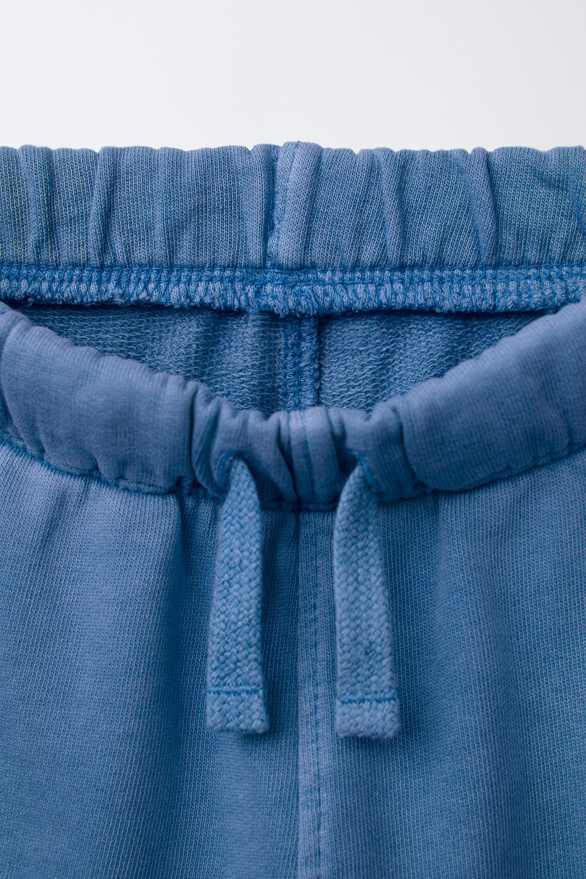 LOGO SEAMED PLUSH SHORTS