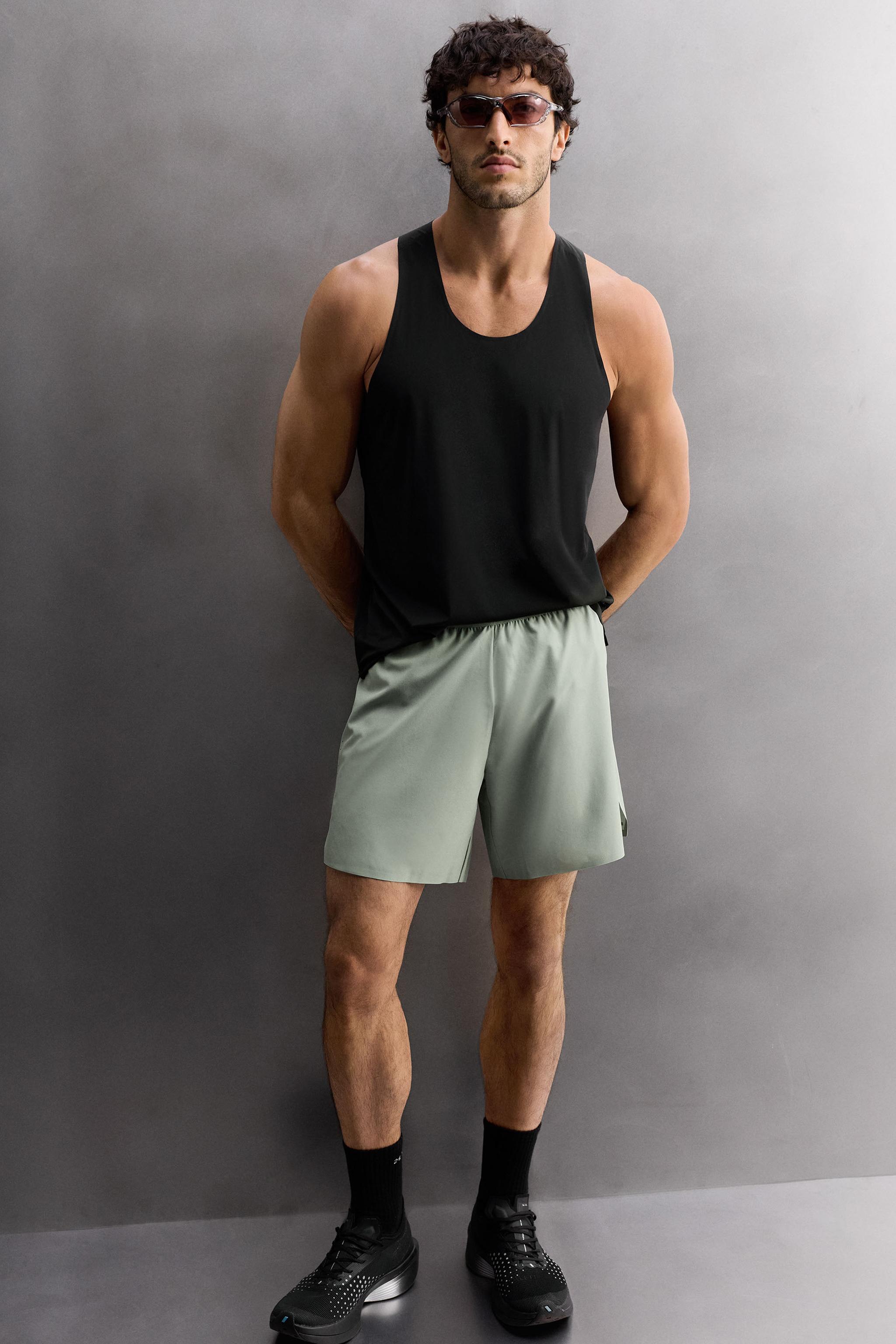 LIGHTWEIGHT PERFORATED SHORTS