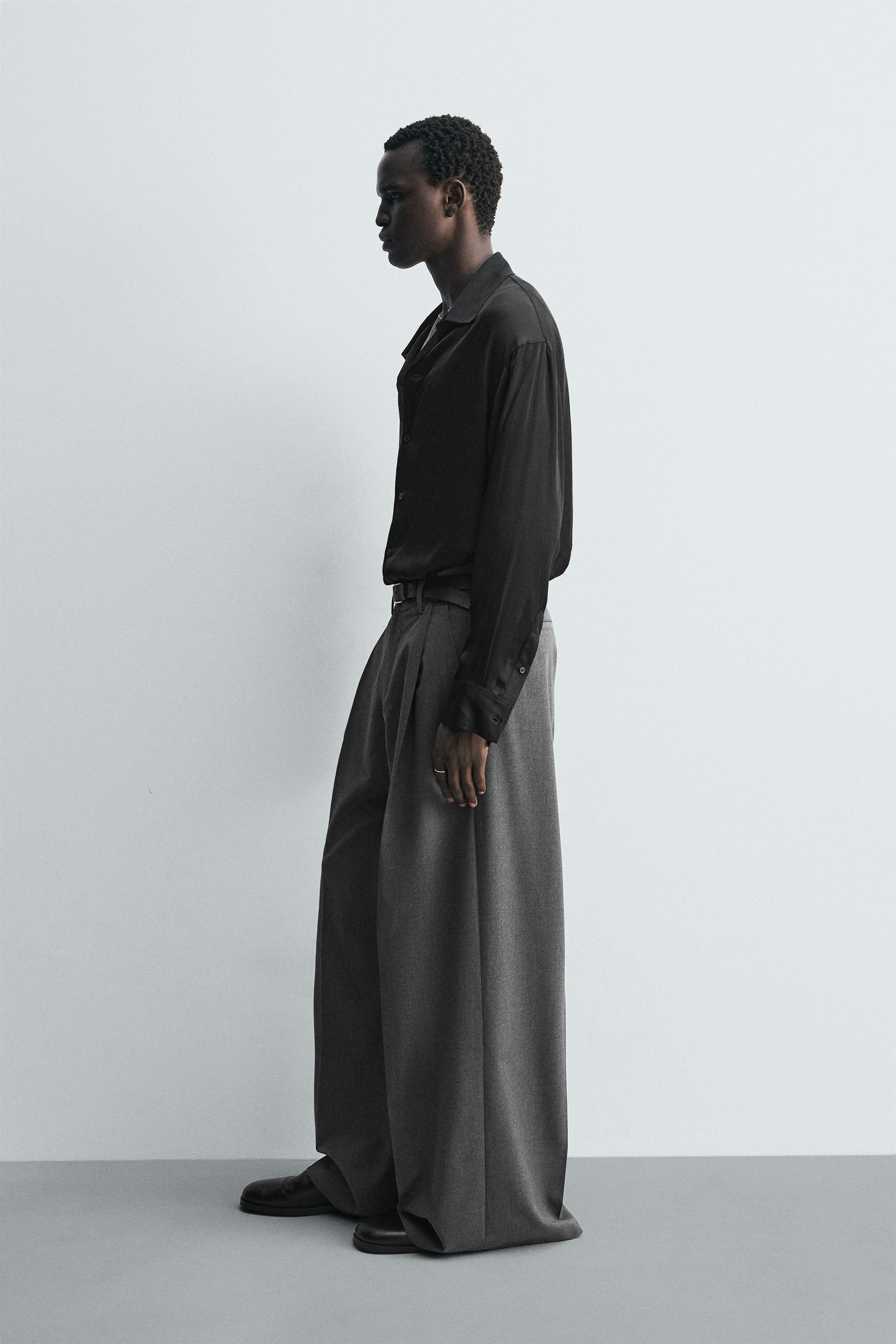 PLEATED WIDE FIT PANTS