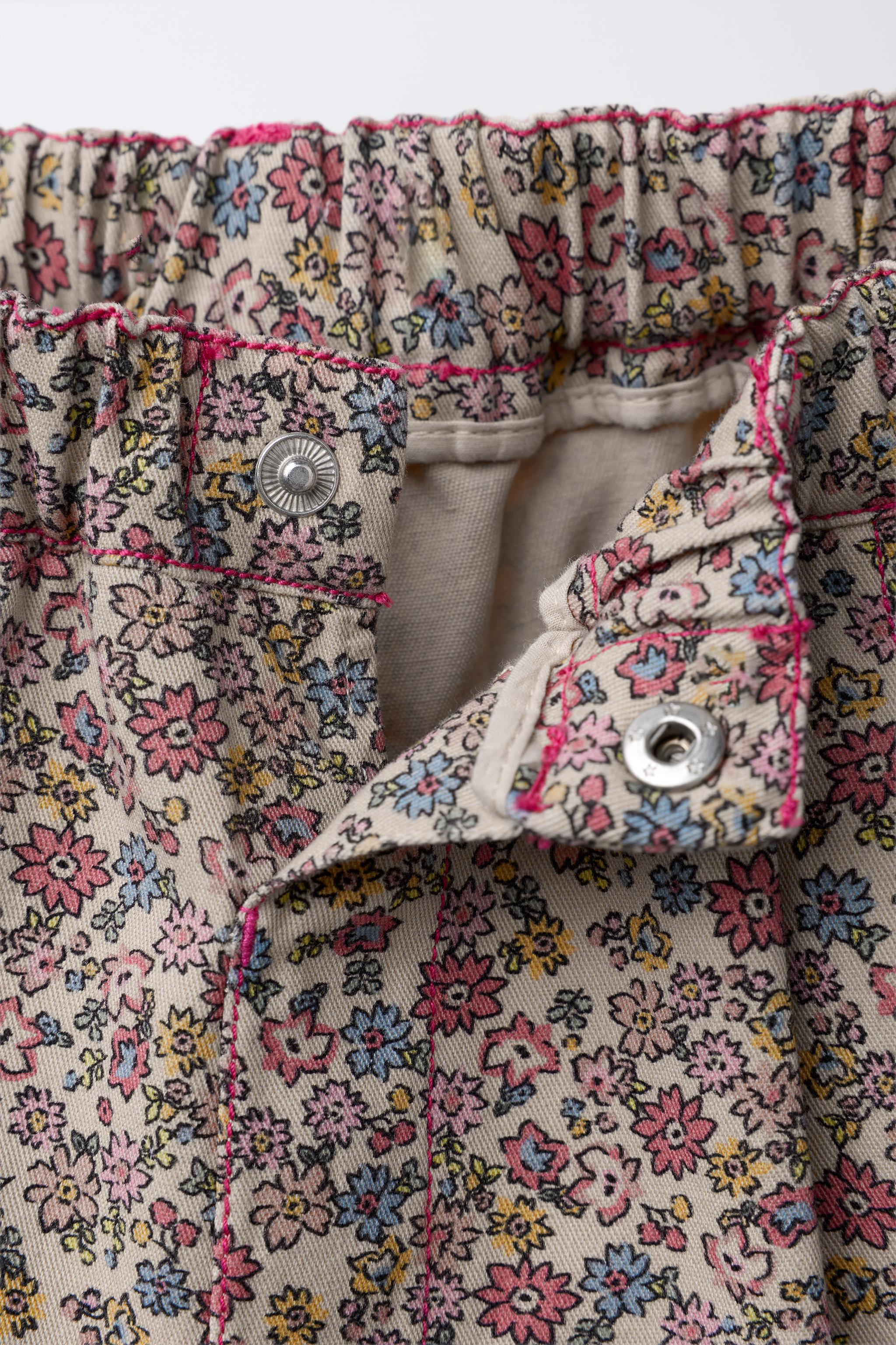 FLOWERED BAGGY PANTS