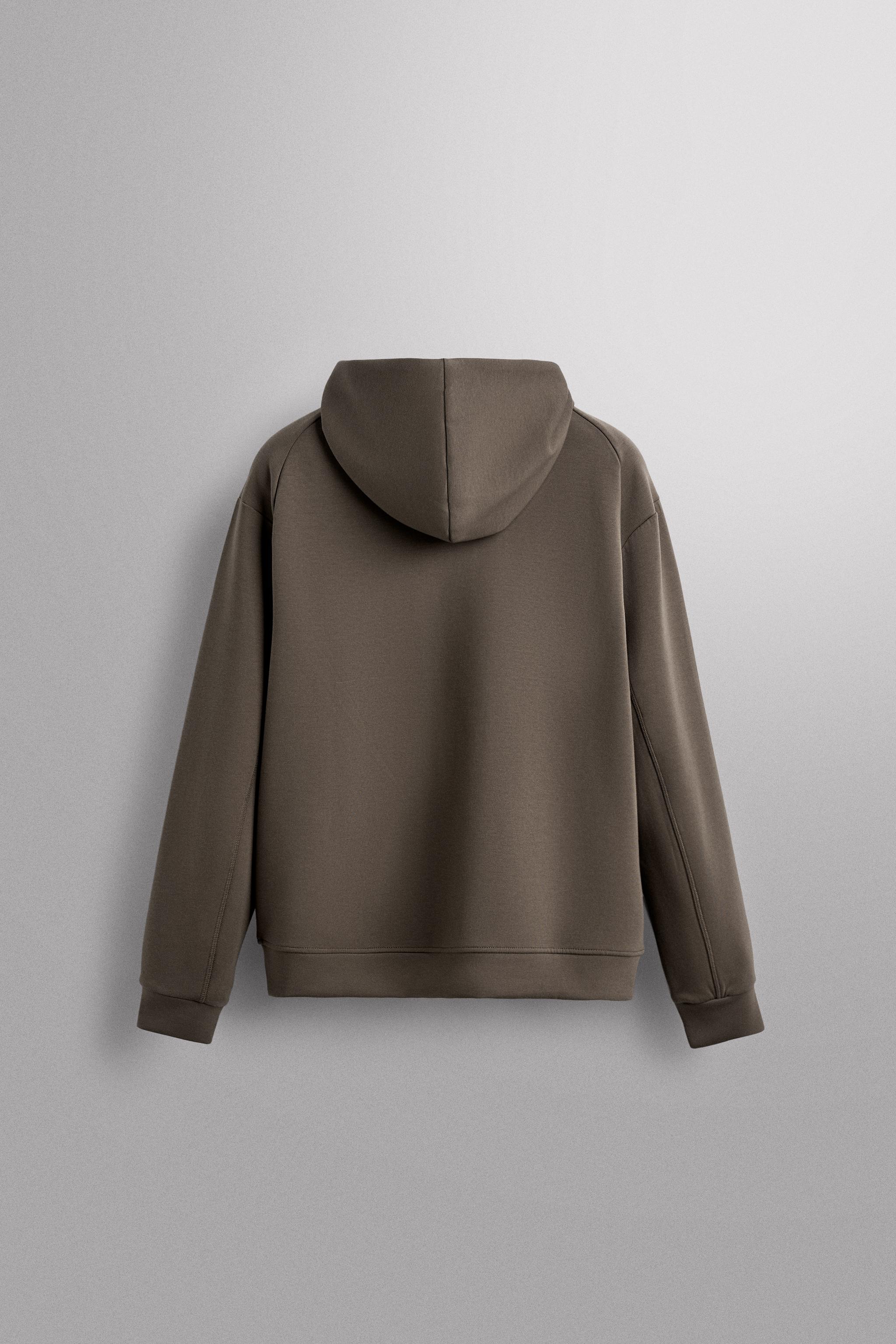 TECHNICAL ZIP-UP HOODIE