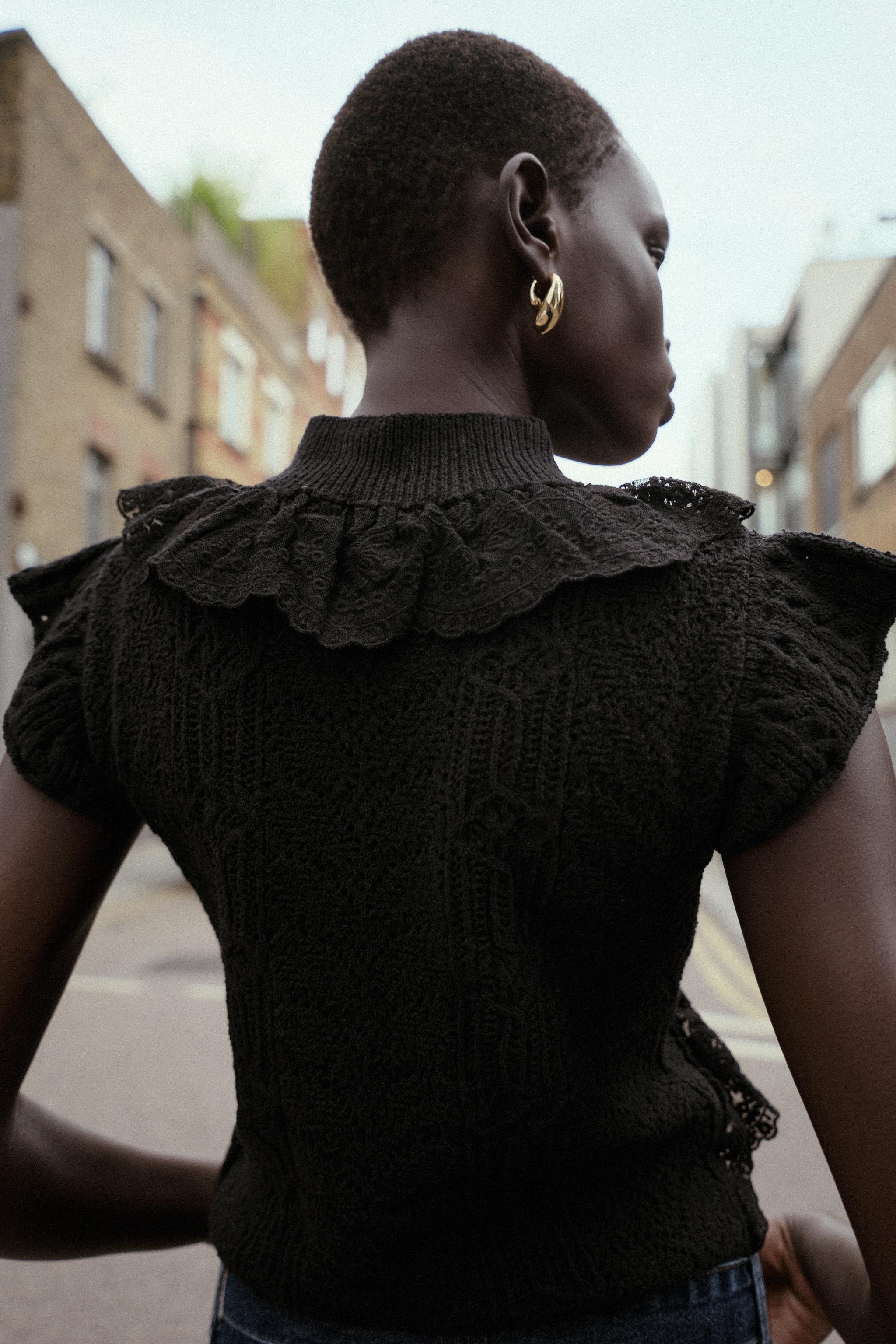 POINTELLE KNIT RUFFLED TOP