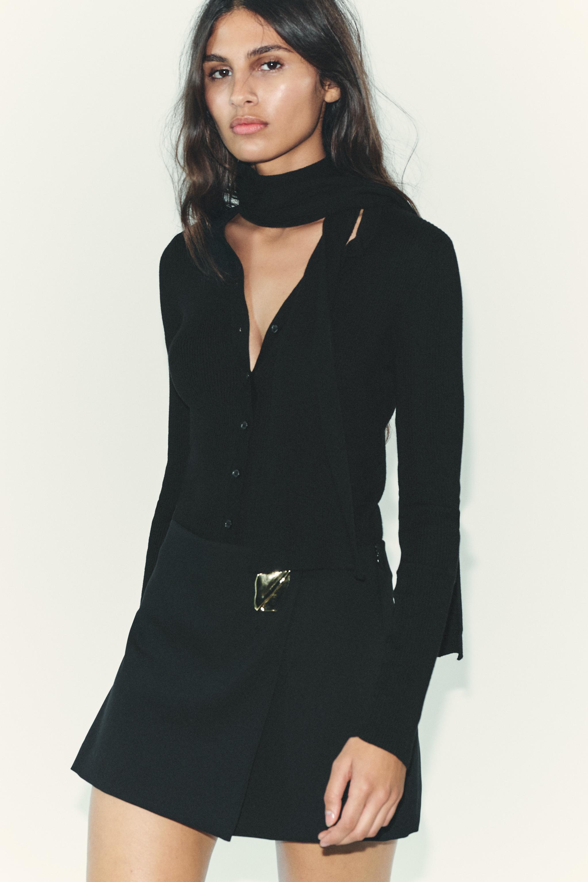 ASYMMETRICAL CULOTTE SKIRT WITH APPLIQUE