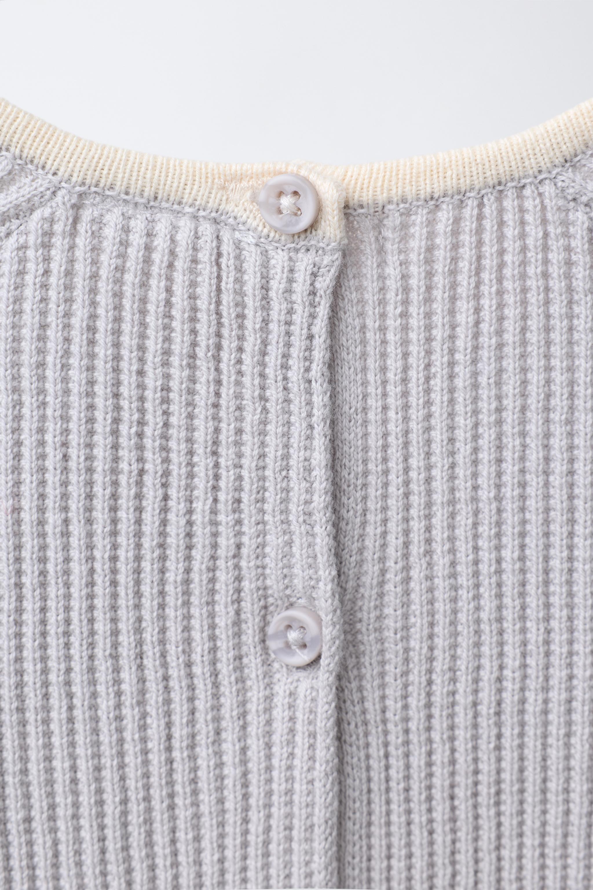CONTRAST PIPING SWEATER