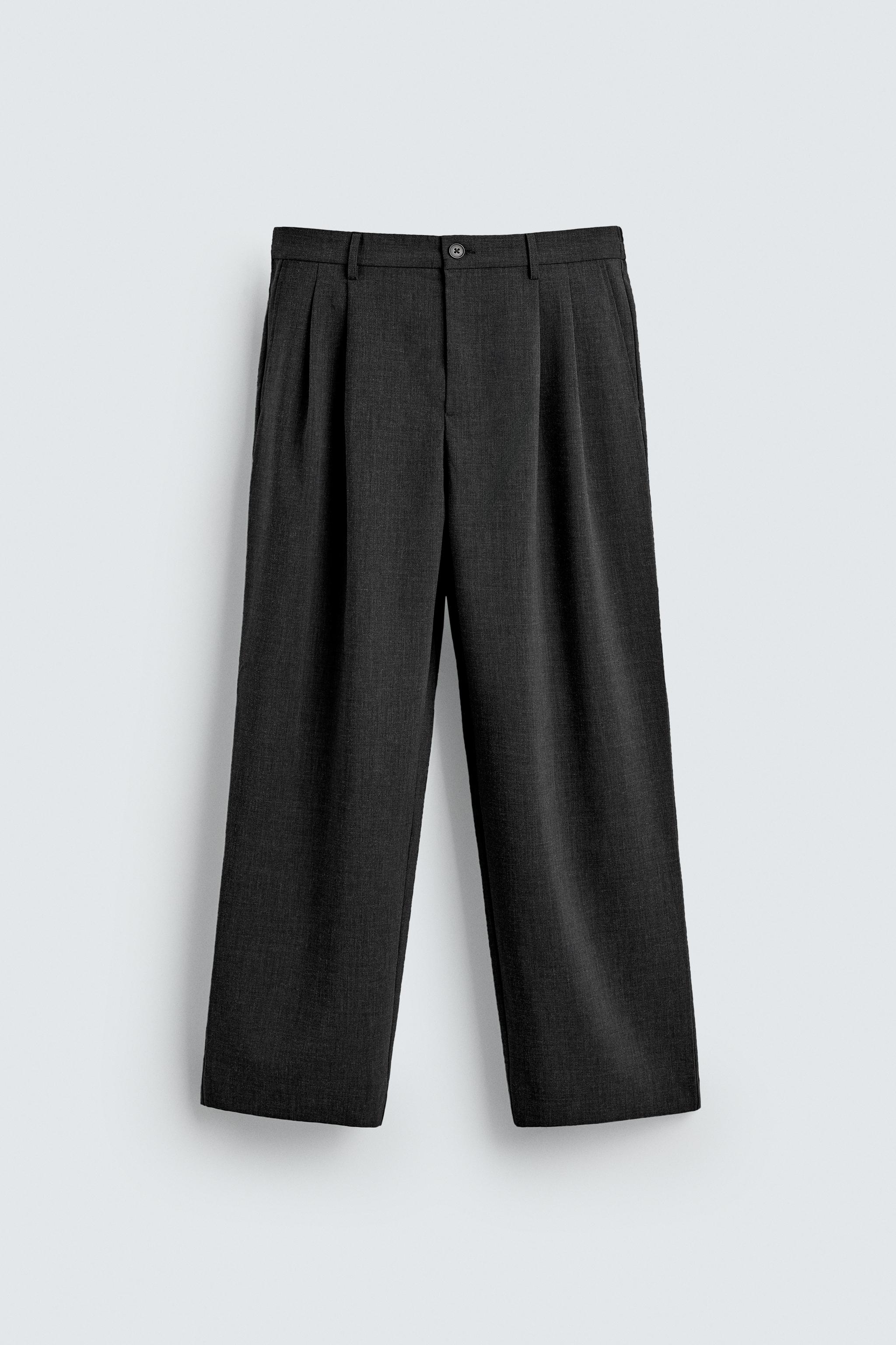 PLEATED WIDE FIT PANTS