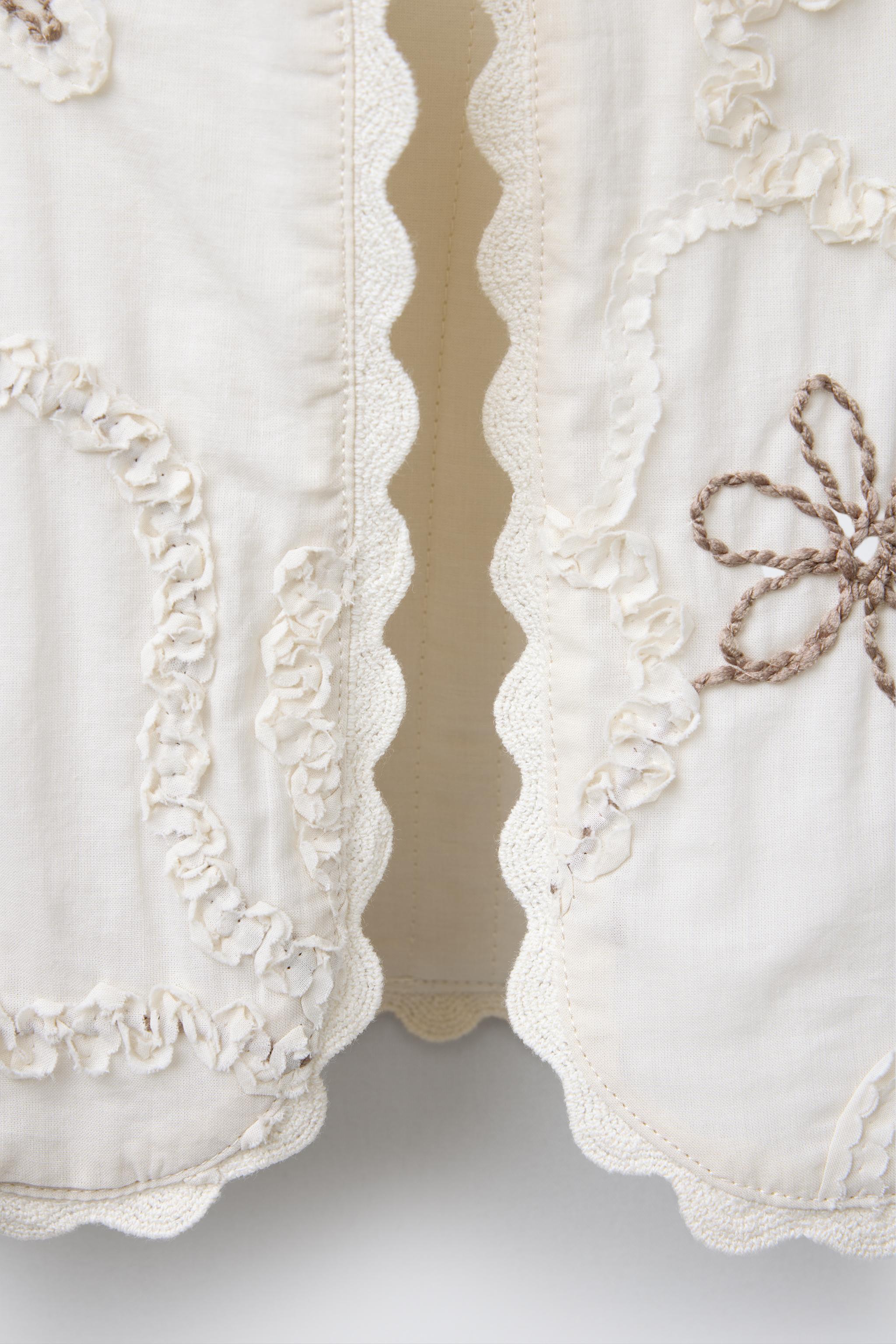 EMBROIDERED FLOWER VEST