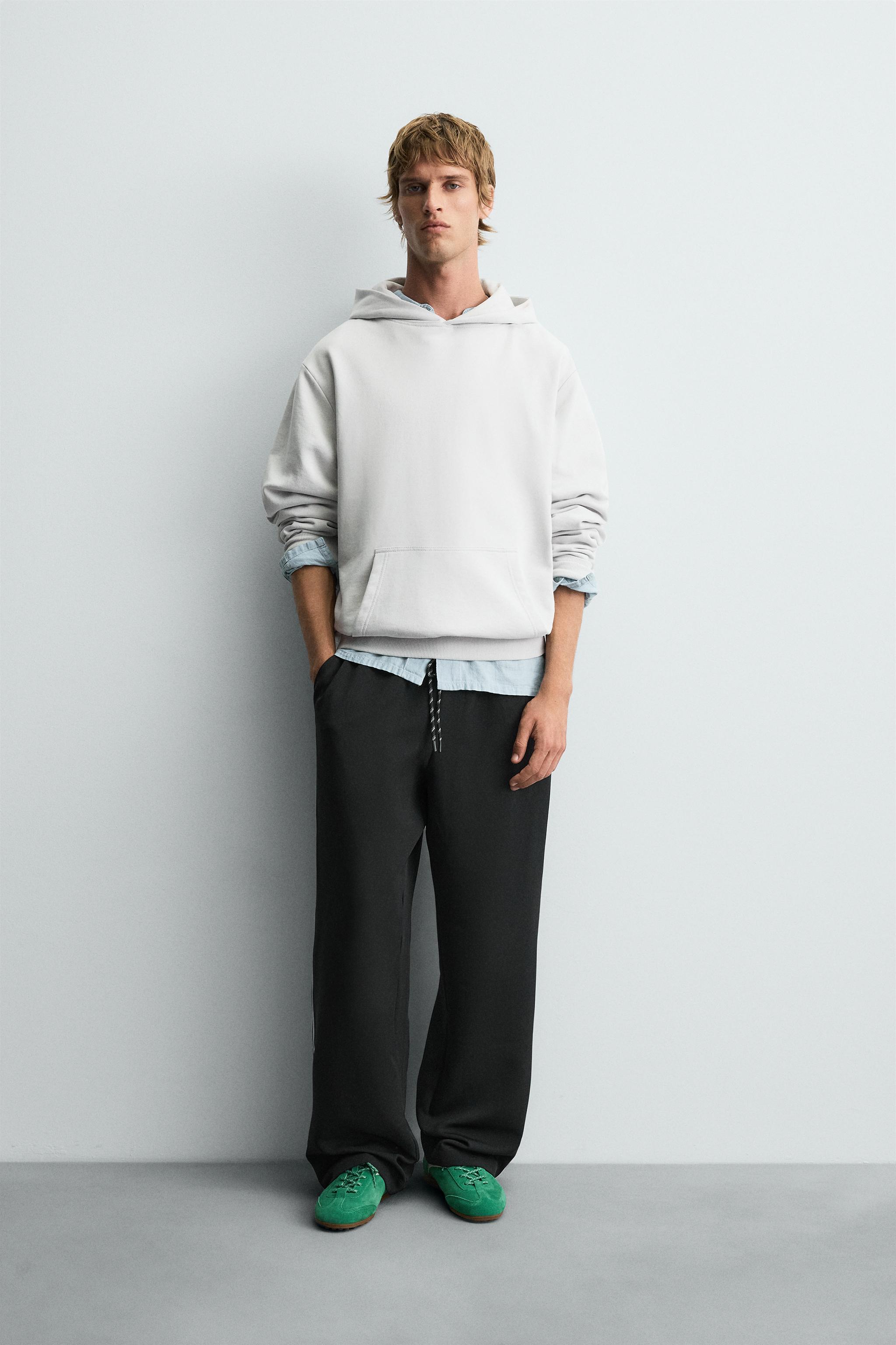 WIDE FIT JOGGER PANTS WITH SIDE STRIPES