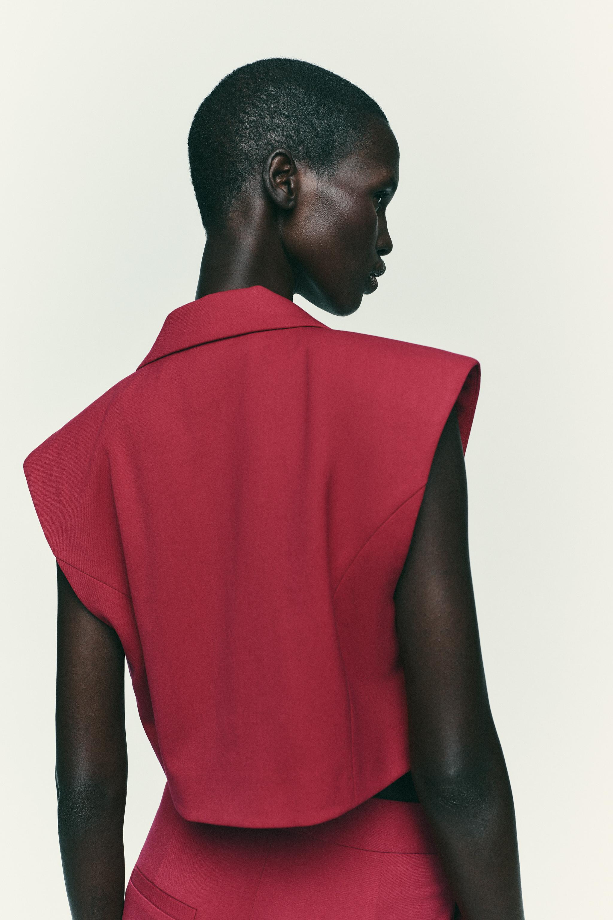 SHORT VEST WITH FLAPS