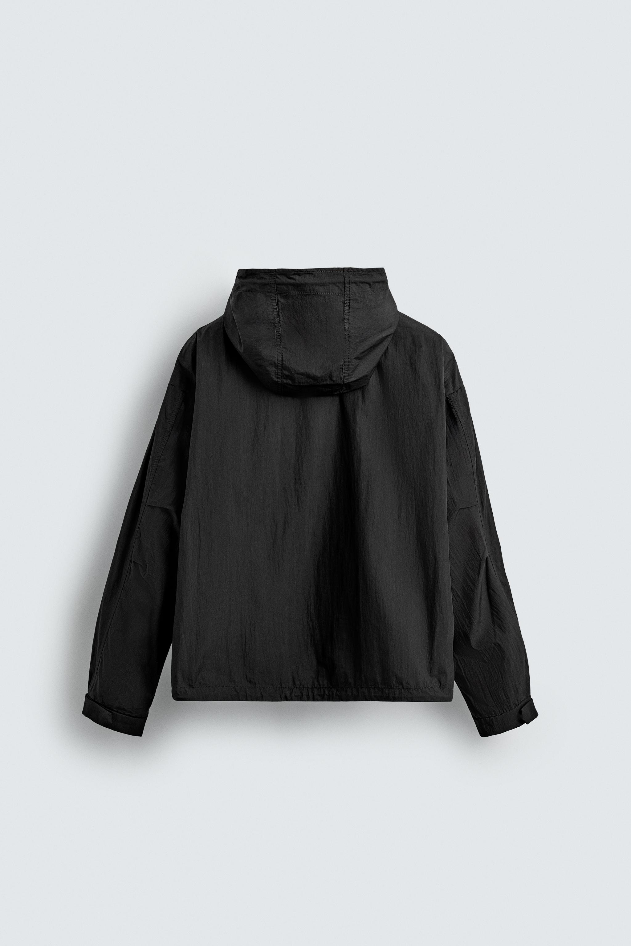 HOODED TECHNICAL JACKET