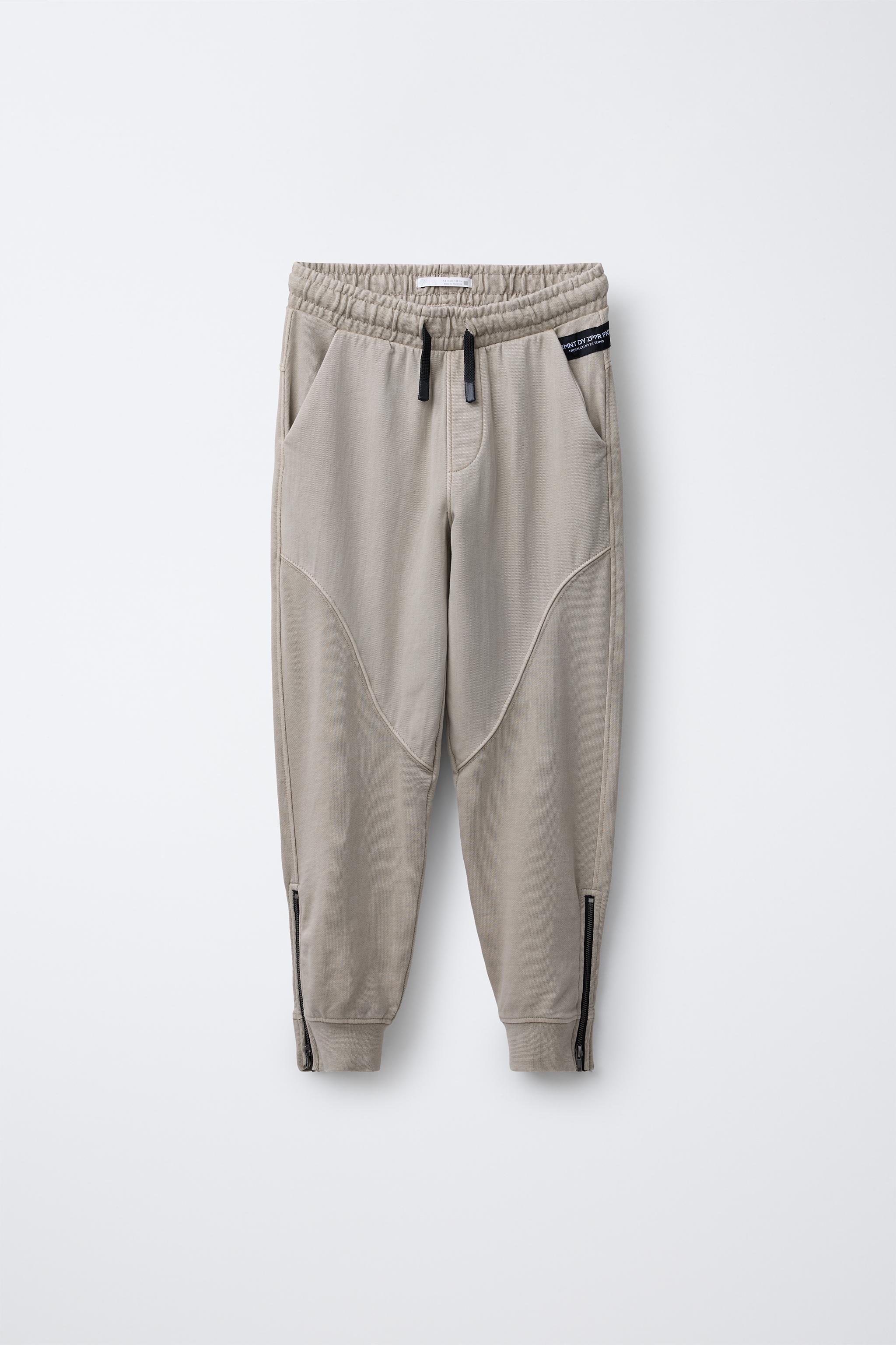 JOGGER PANTS WITH ZIPPERS