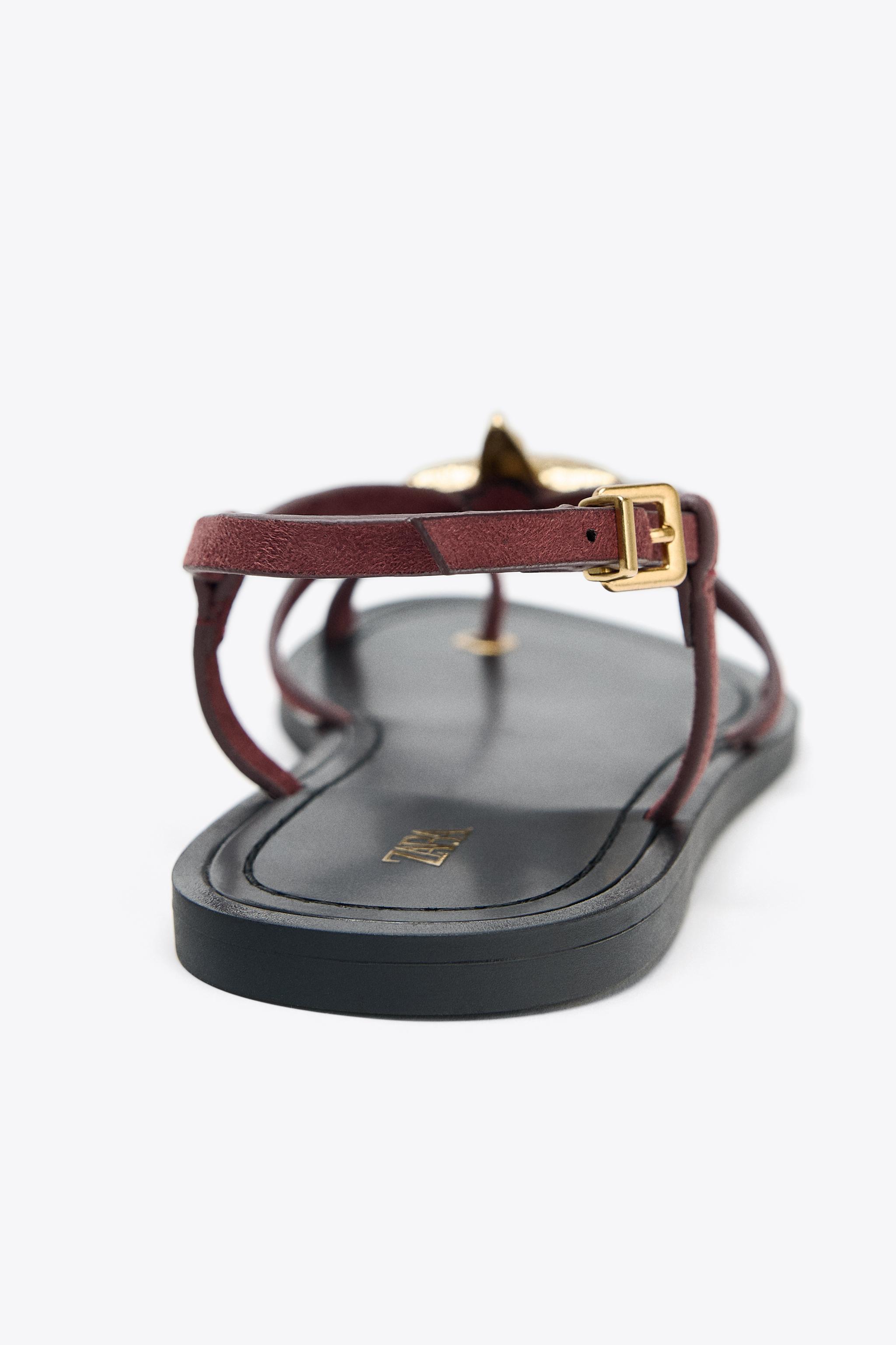 STRAPPY SANDALS WITH METALLIC DETAIL