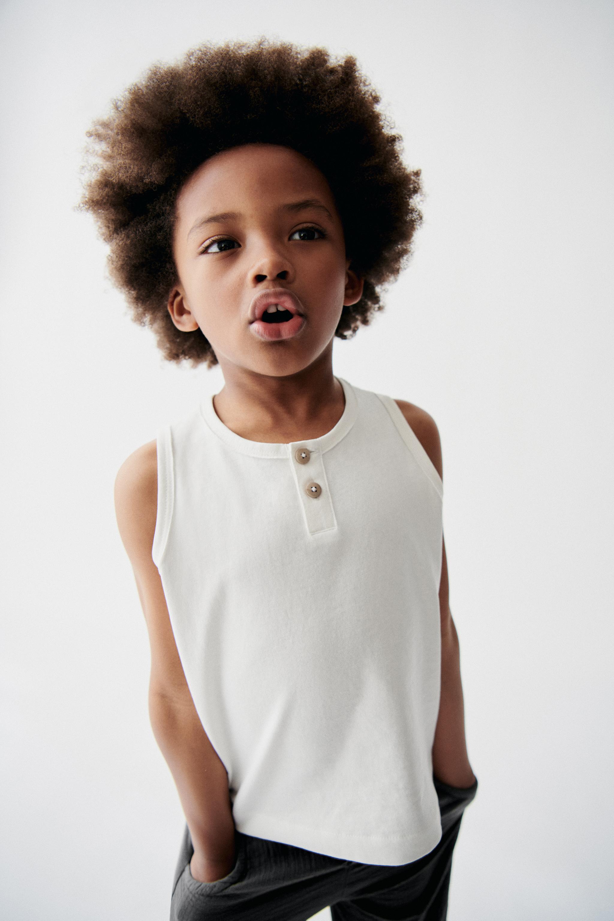 SLEEVELESS TOP WITH BUTTONS