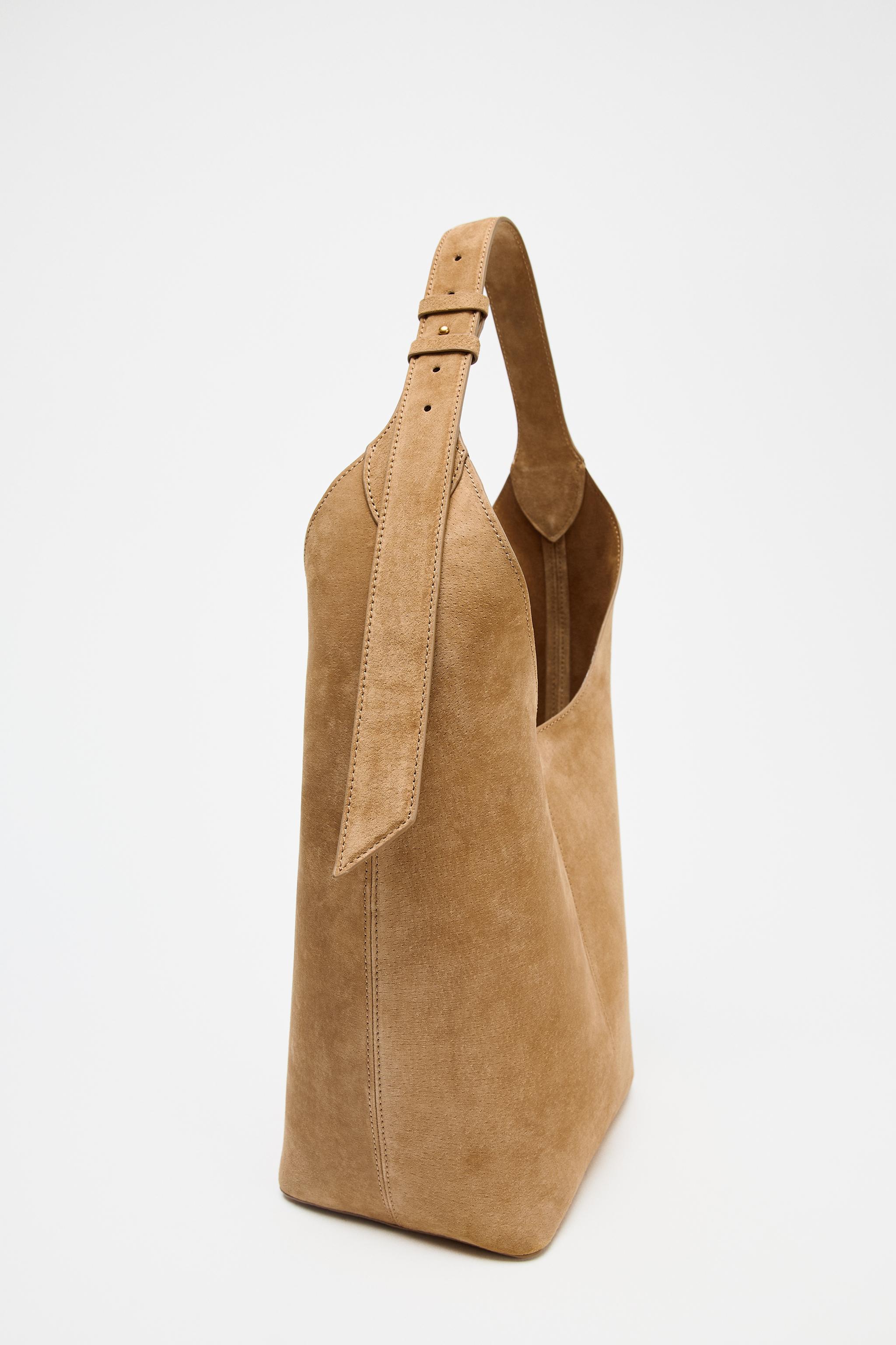 LEATHER MAXI BUCKET BAG WITH HANDLE DETAIL