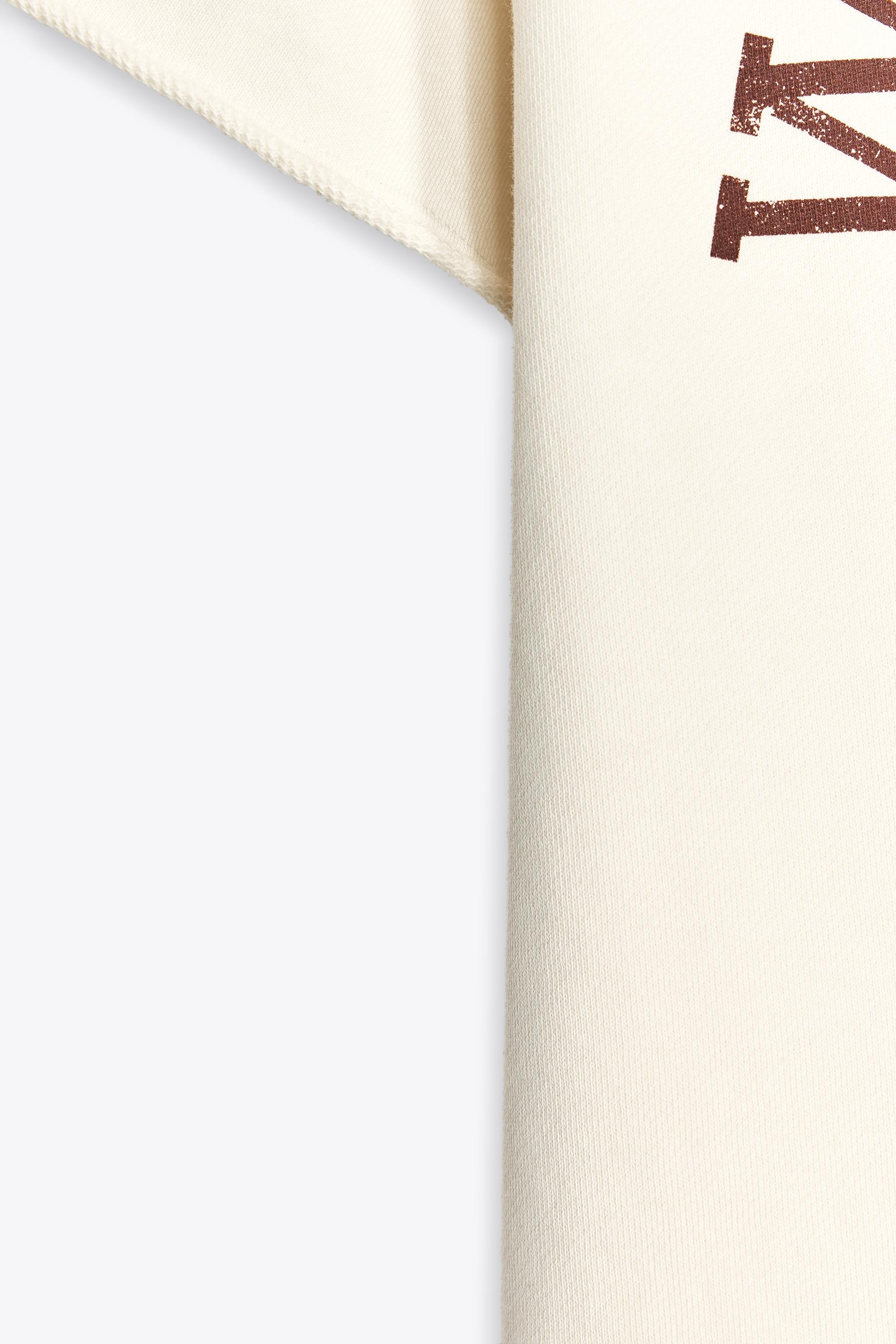 WASHED EFFECT TEXT PLUSH SWEATSHIRT