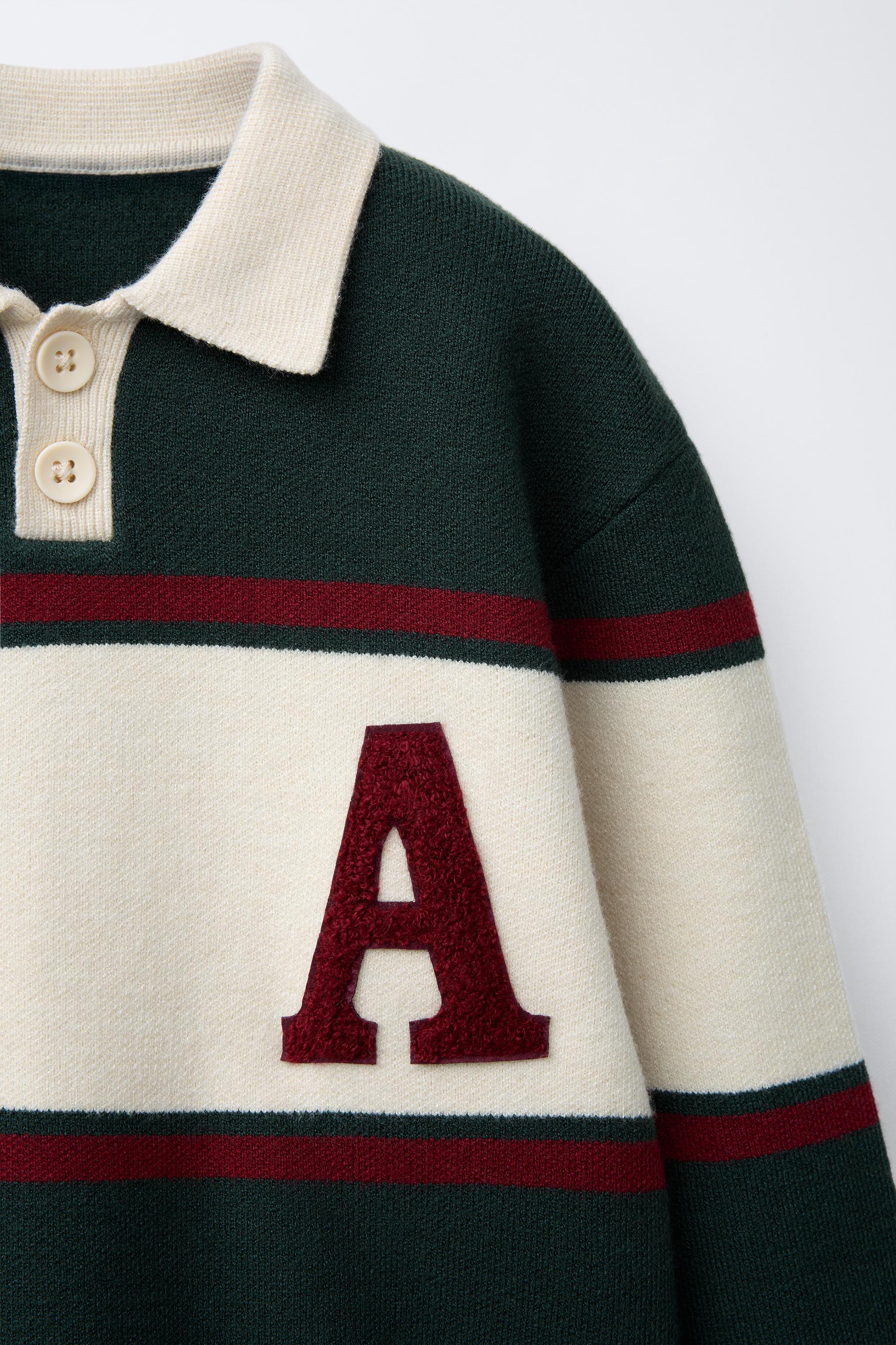 VARSITY KNIT POLO