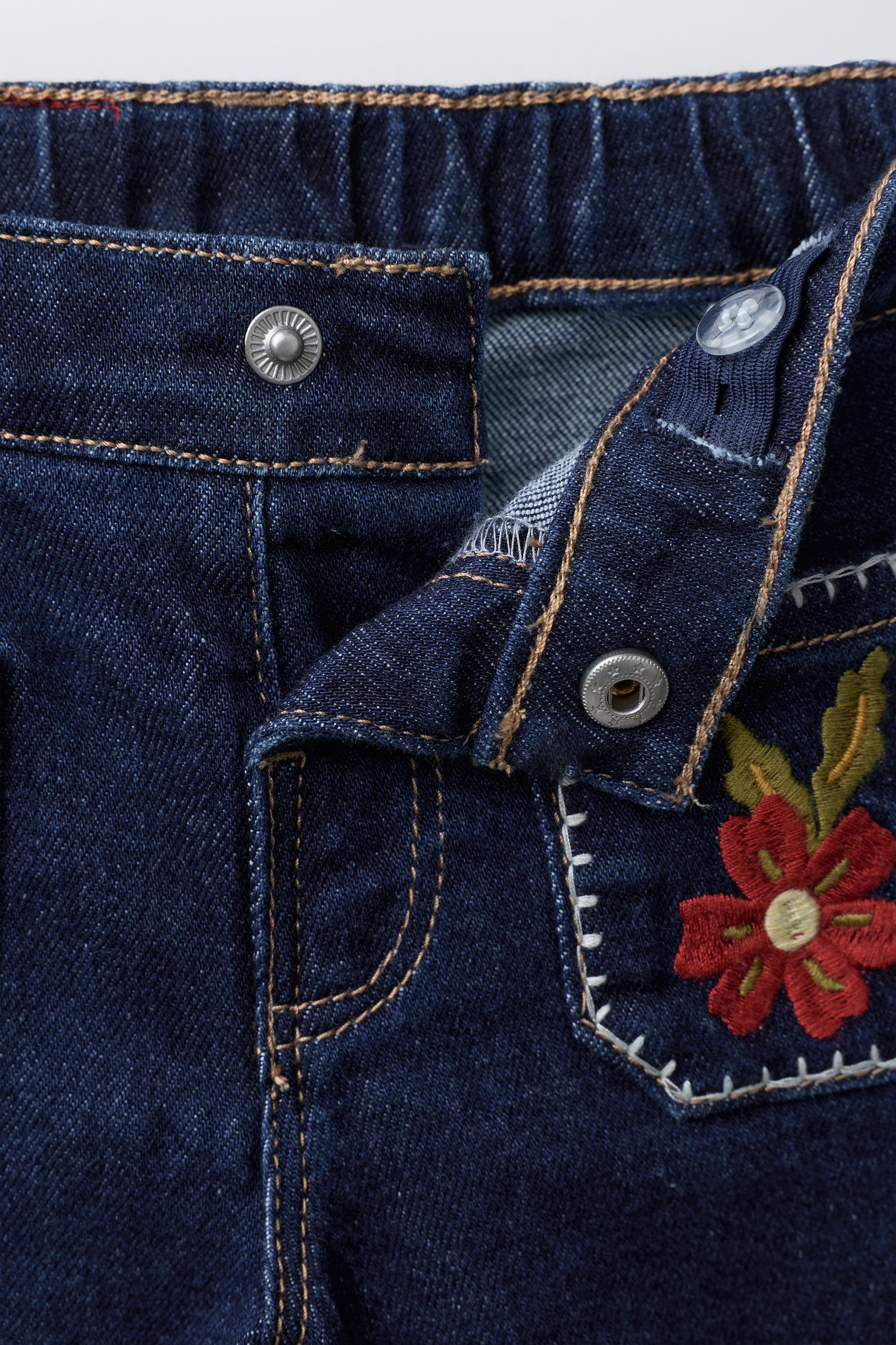 EMBROIDERED POCKET NAVY JEANS