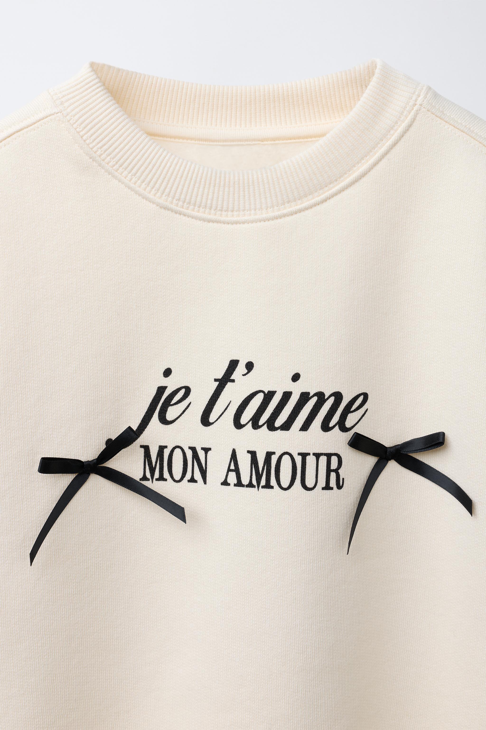 TEXT AND BOW PRINT SWEATSHIRT