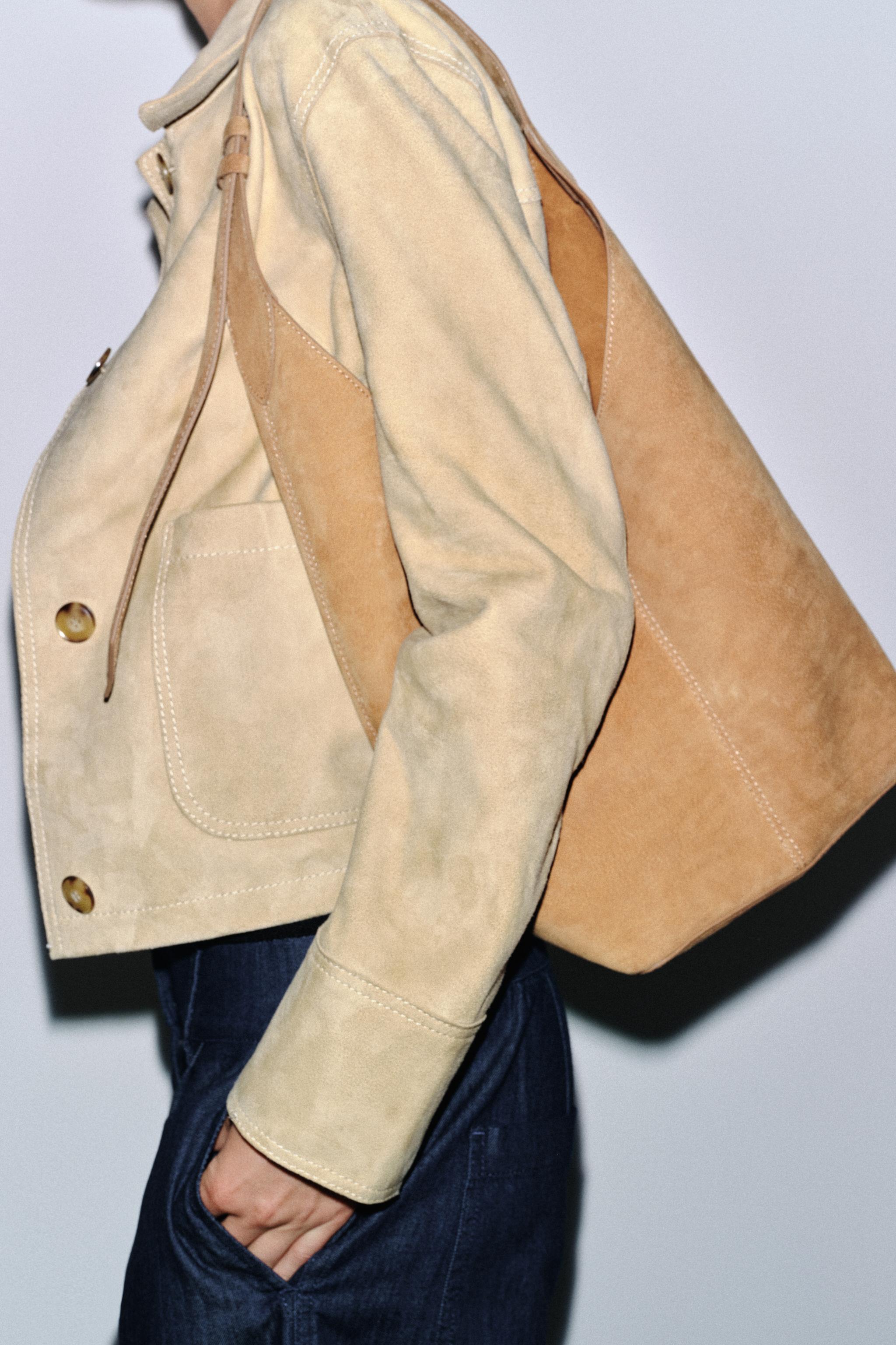 LEATHER MAXI BUCKET BAG WITH HANDLE DETAIL