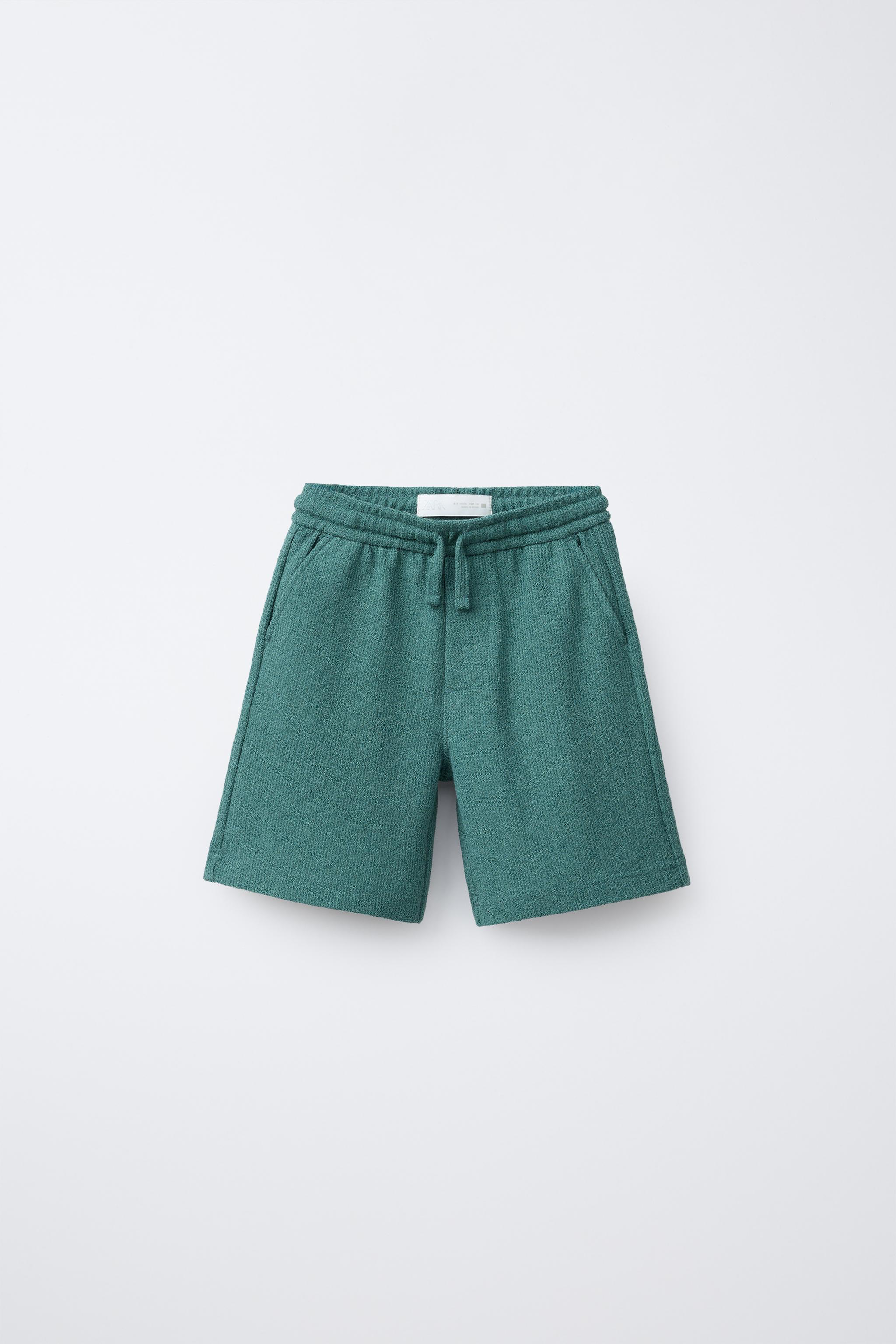 SLIM FIT TEXTURED TOWELING SHORTS
