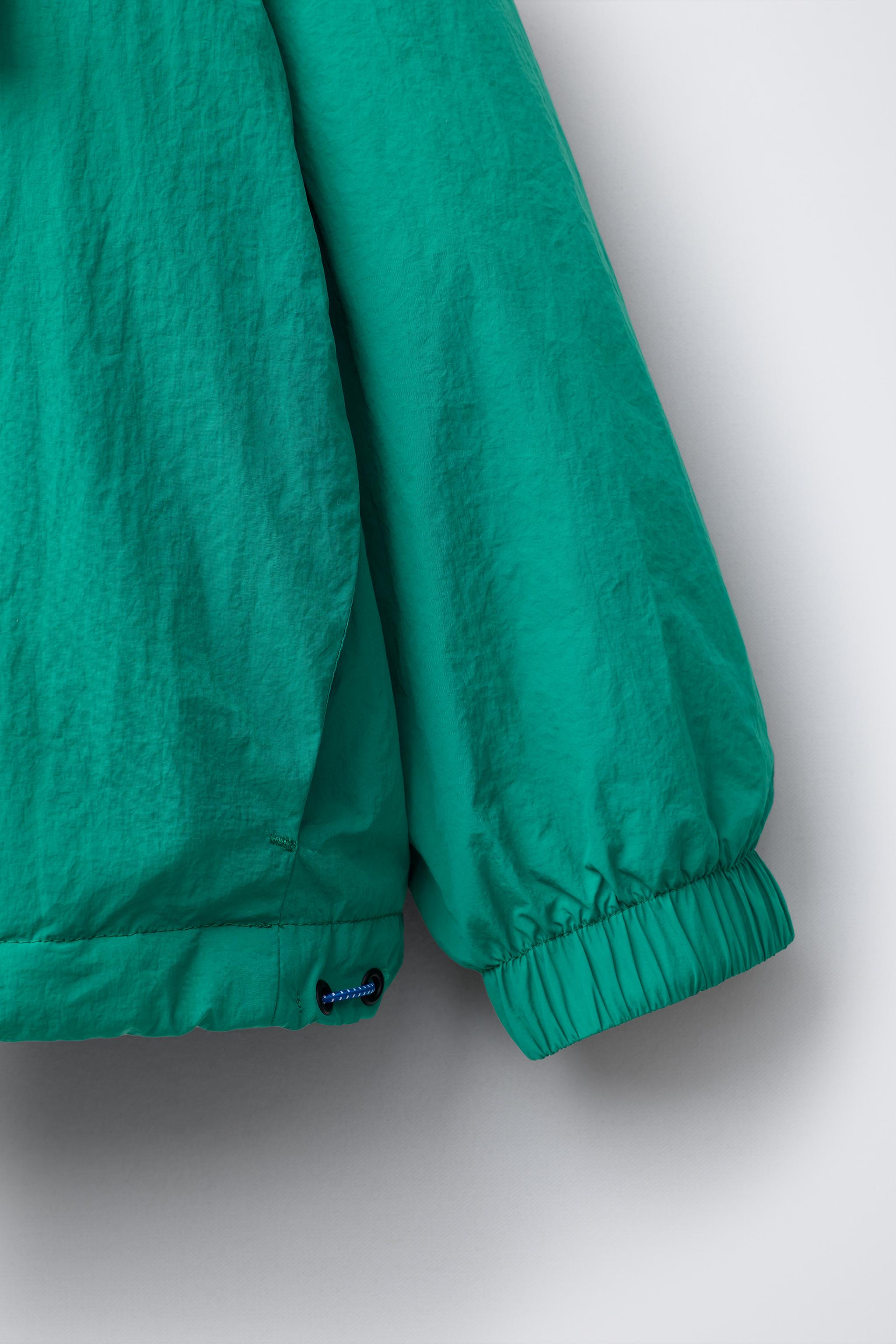 TECHNICAL POUCH POCKET SWEATSHIRT