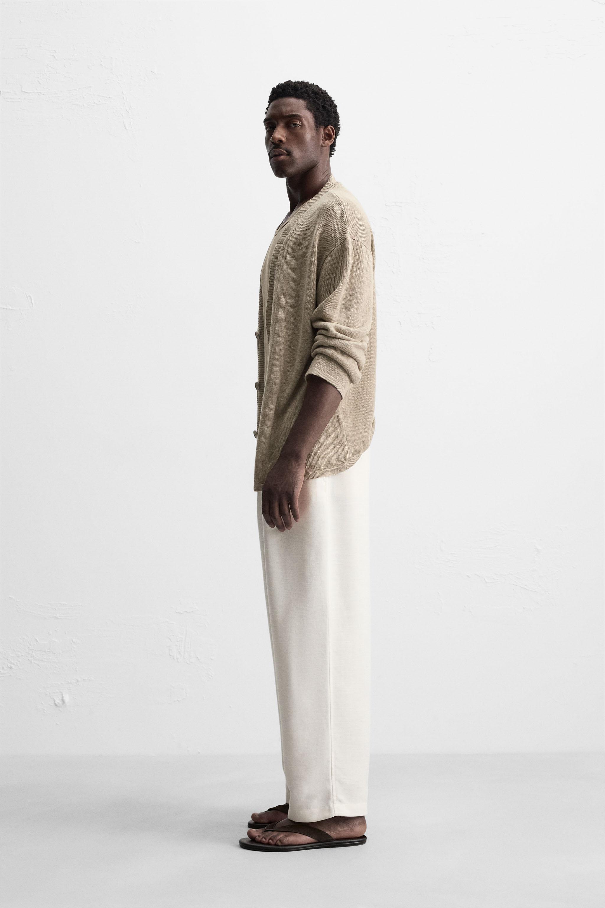 PLEATED RELAXED FIT PANTS