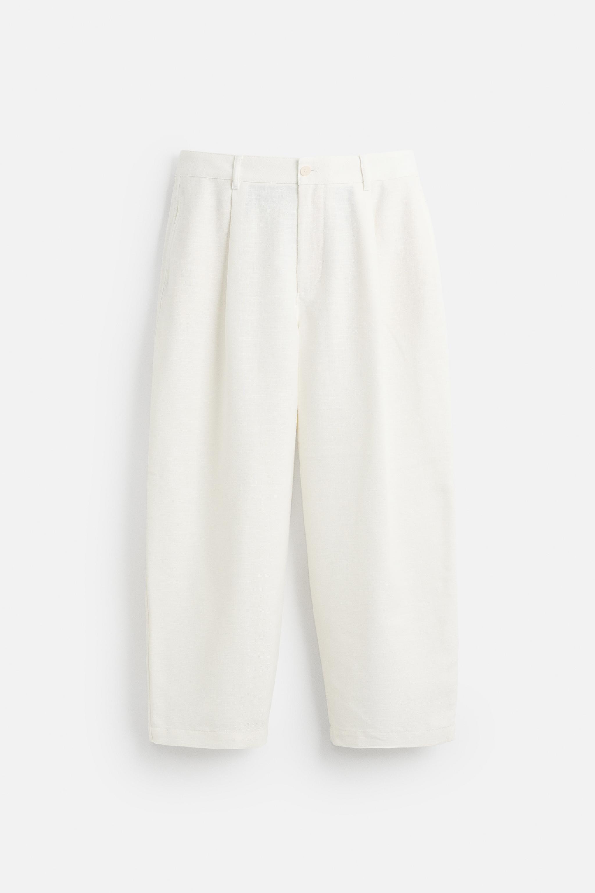 PLEATED RELAXED FIT PANTS