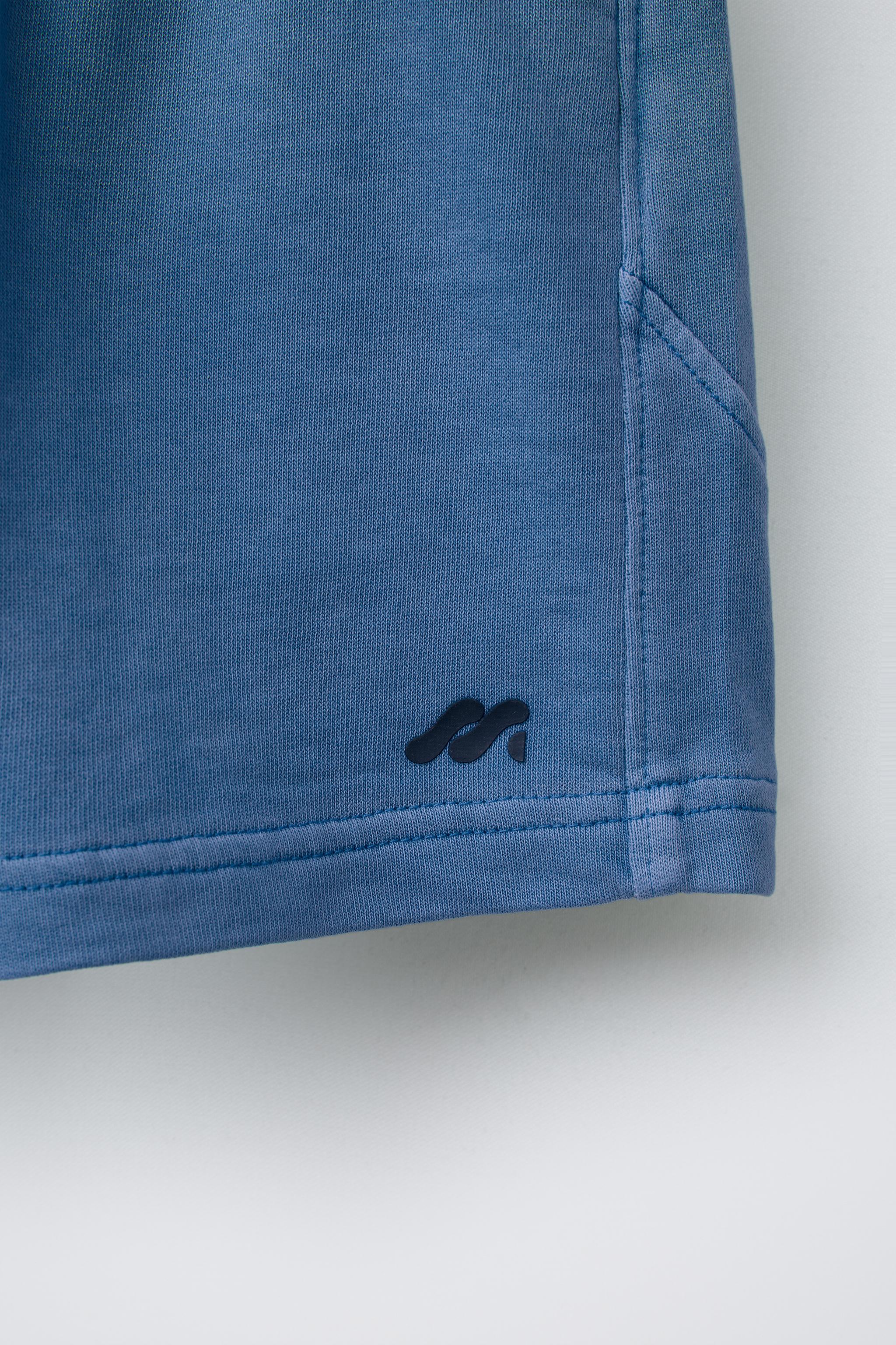 LOGO SEAMED PLUSH SHORTS