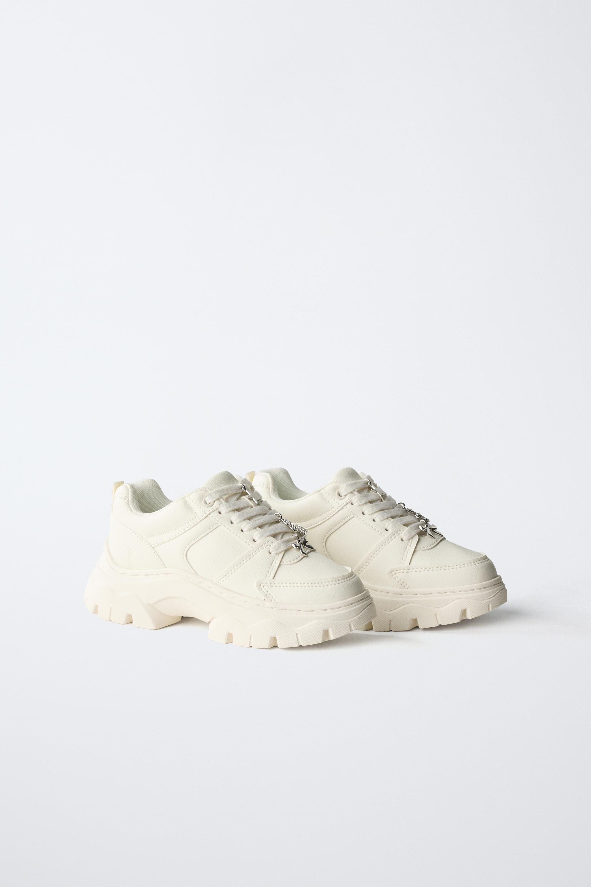 THICK-SOLED SNEAKERS WITH CHARMS