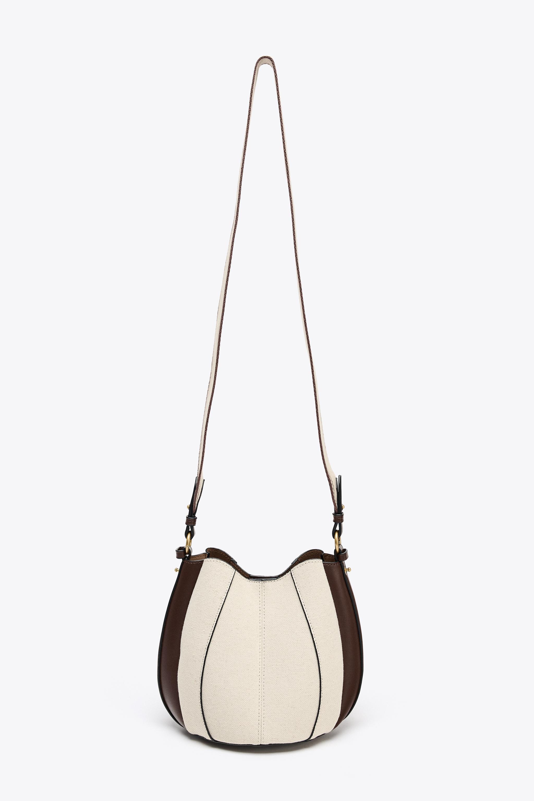 TOPSTITCHED BUCKET BAG