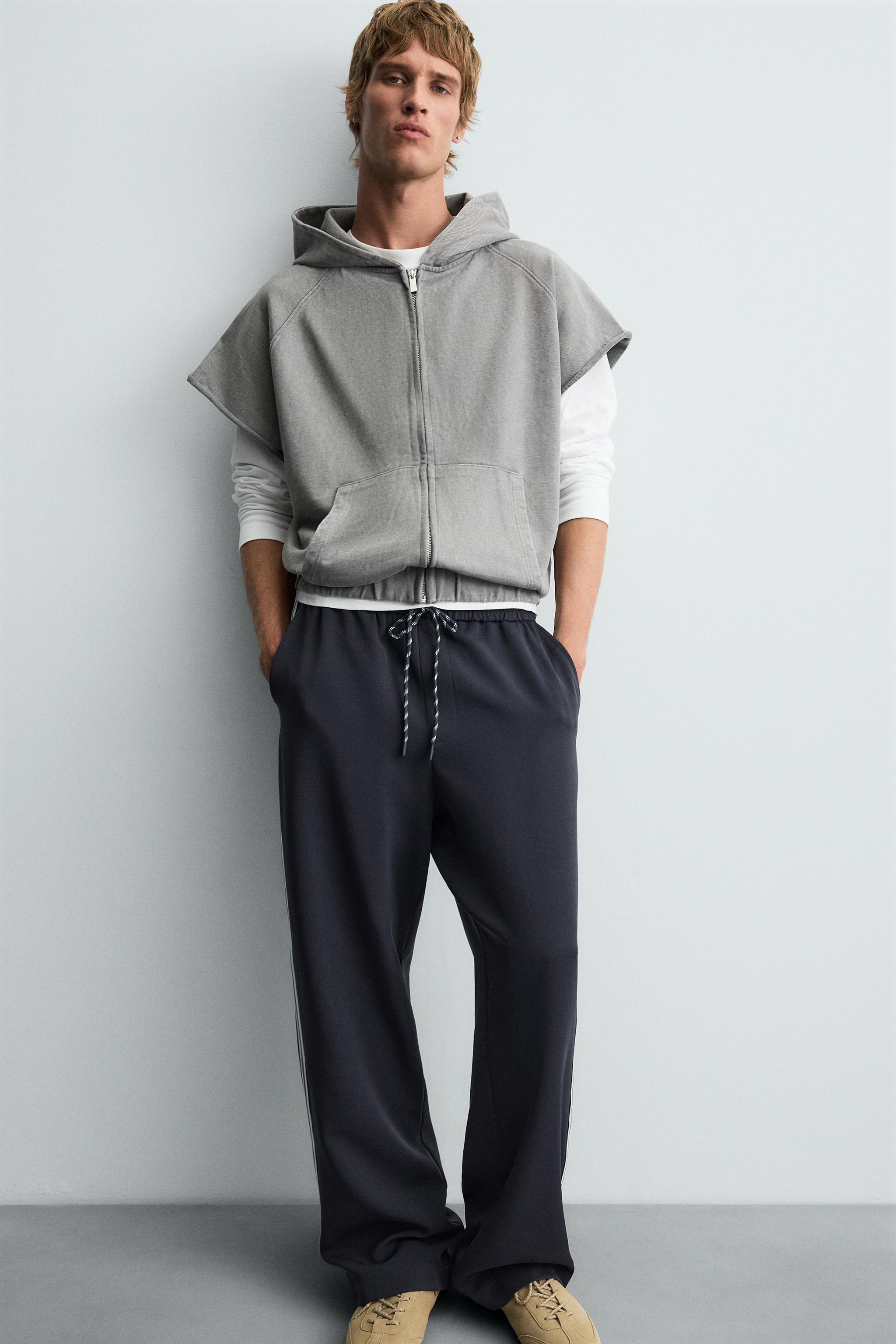 WIDE FIT JOGGER PANTS WITH SIDE STRIPES