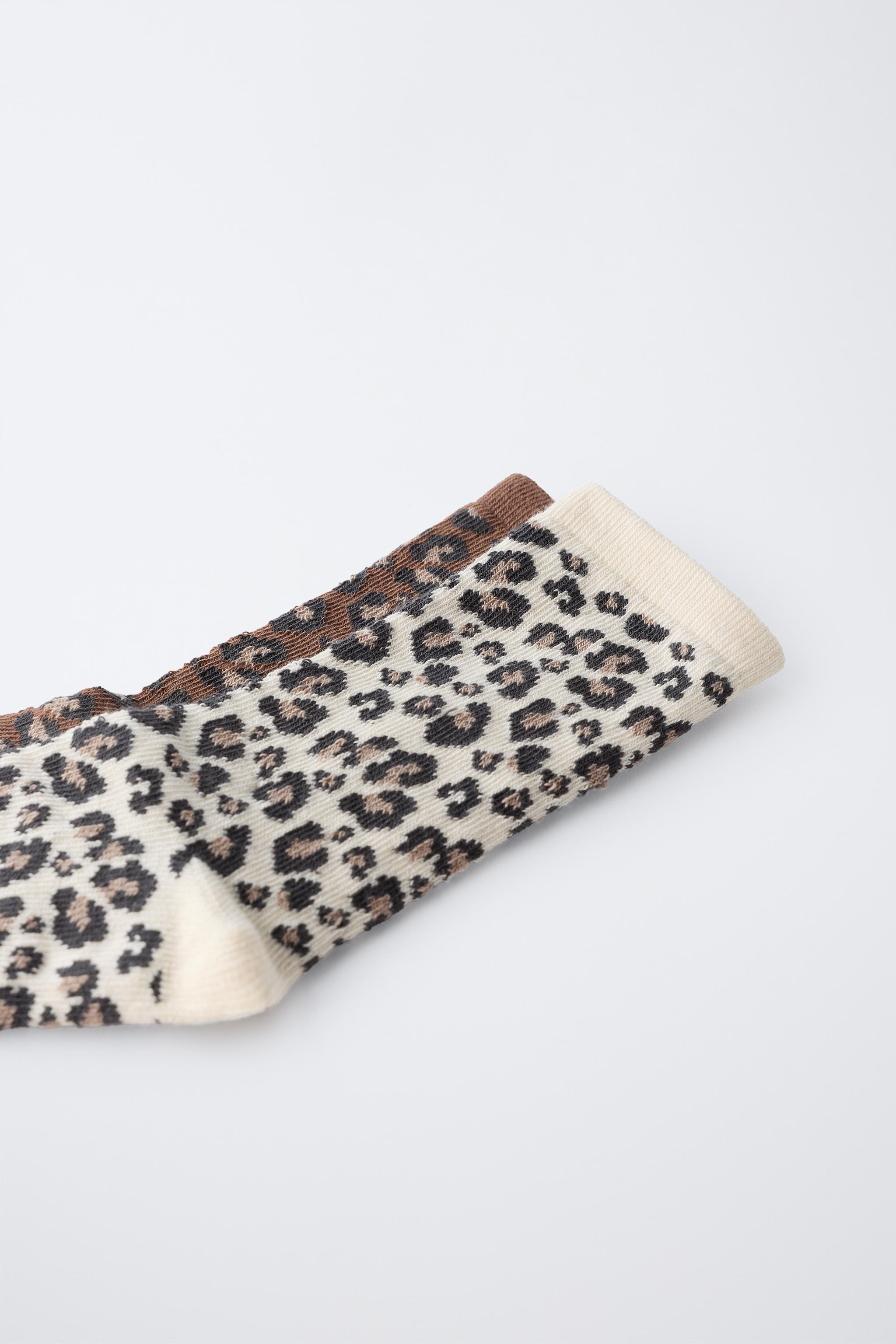 TWO-PACK OF LONG ANIMAL PRINT SOCKS
