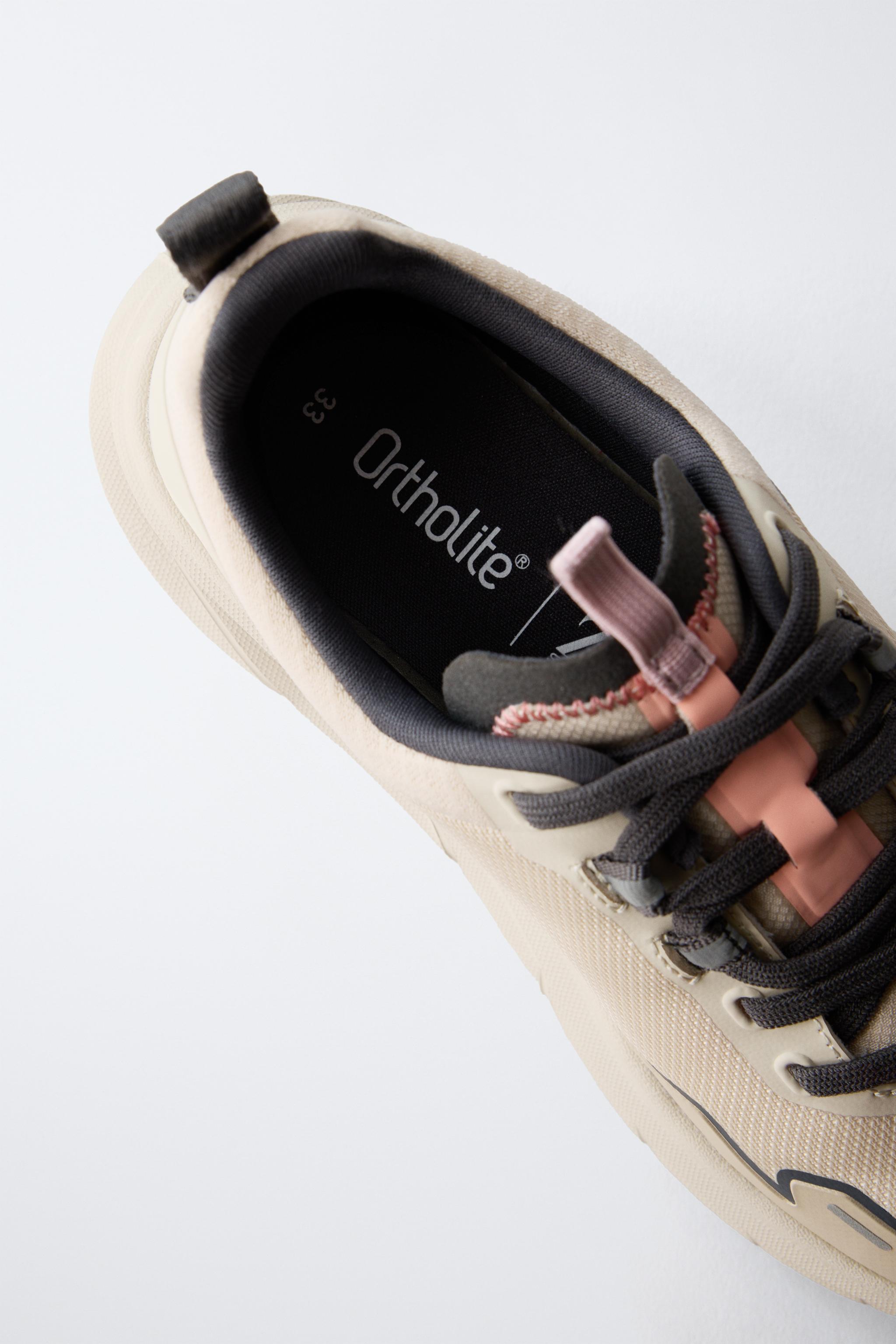 SNEAKERS WITH SOLE DETAIL