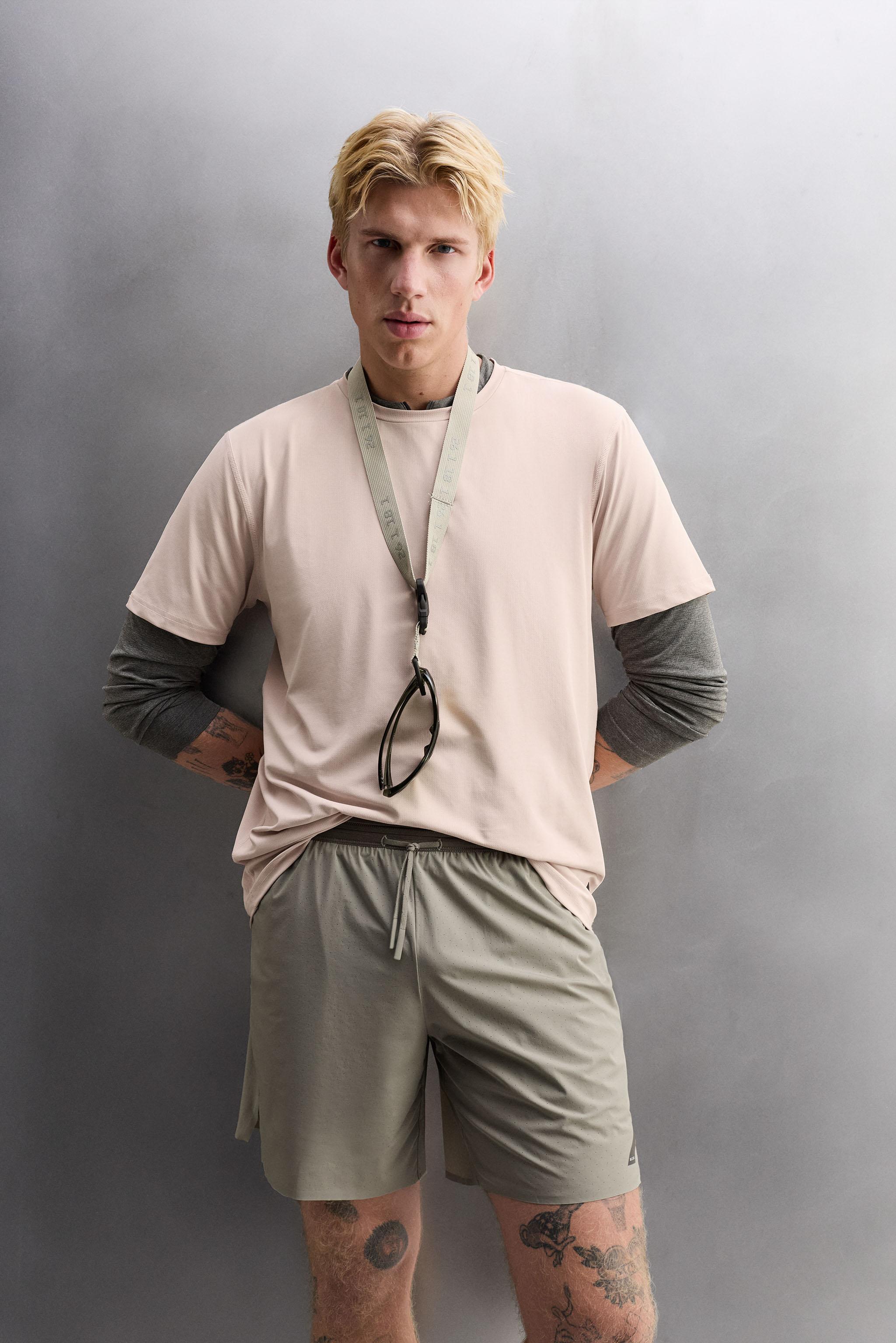 LIGHTWEIGHT PERFORATED SHORTS