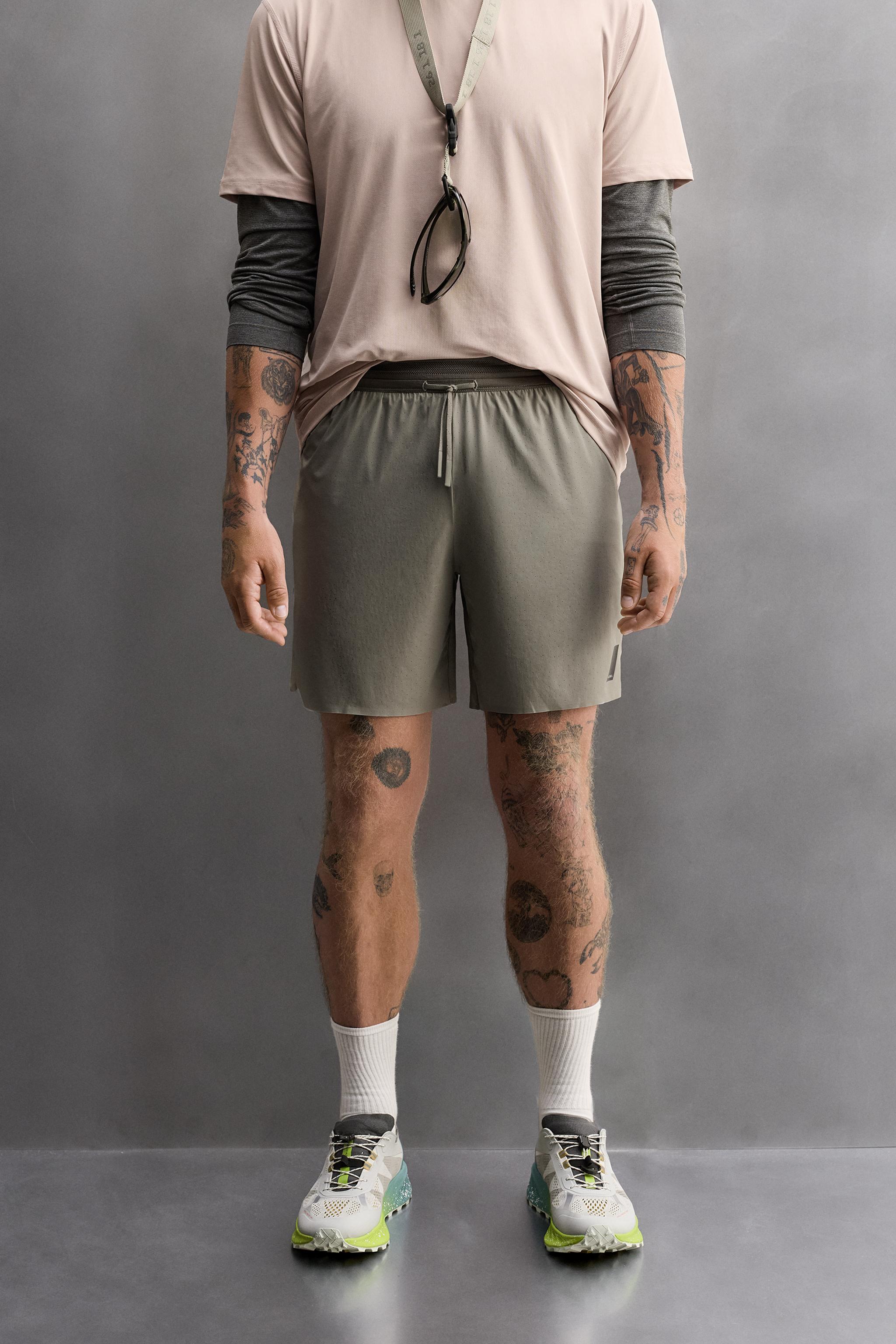 LIGHTWEIGHT PERFORATED SHORTS