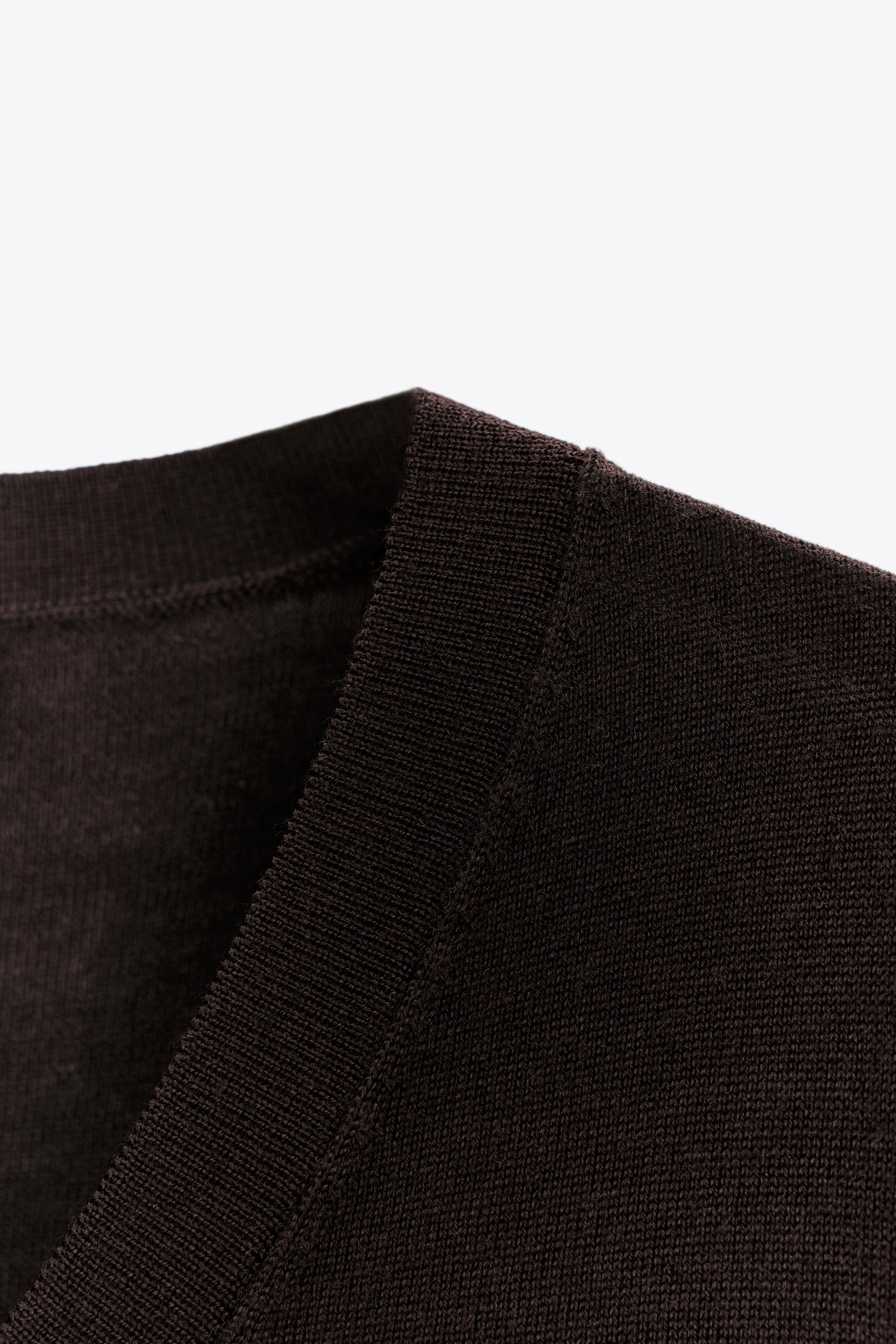 SHORT SLEEVE 100% WOOL SWEATER