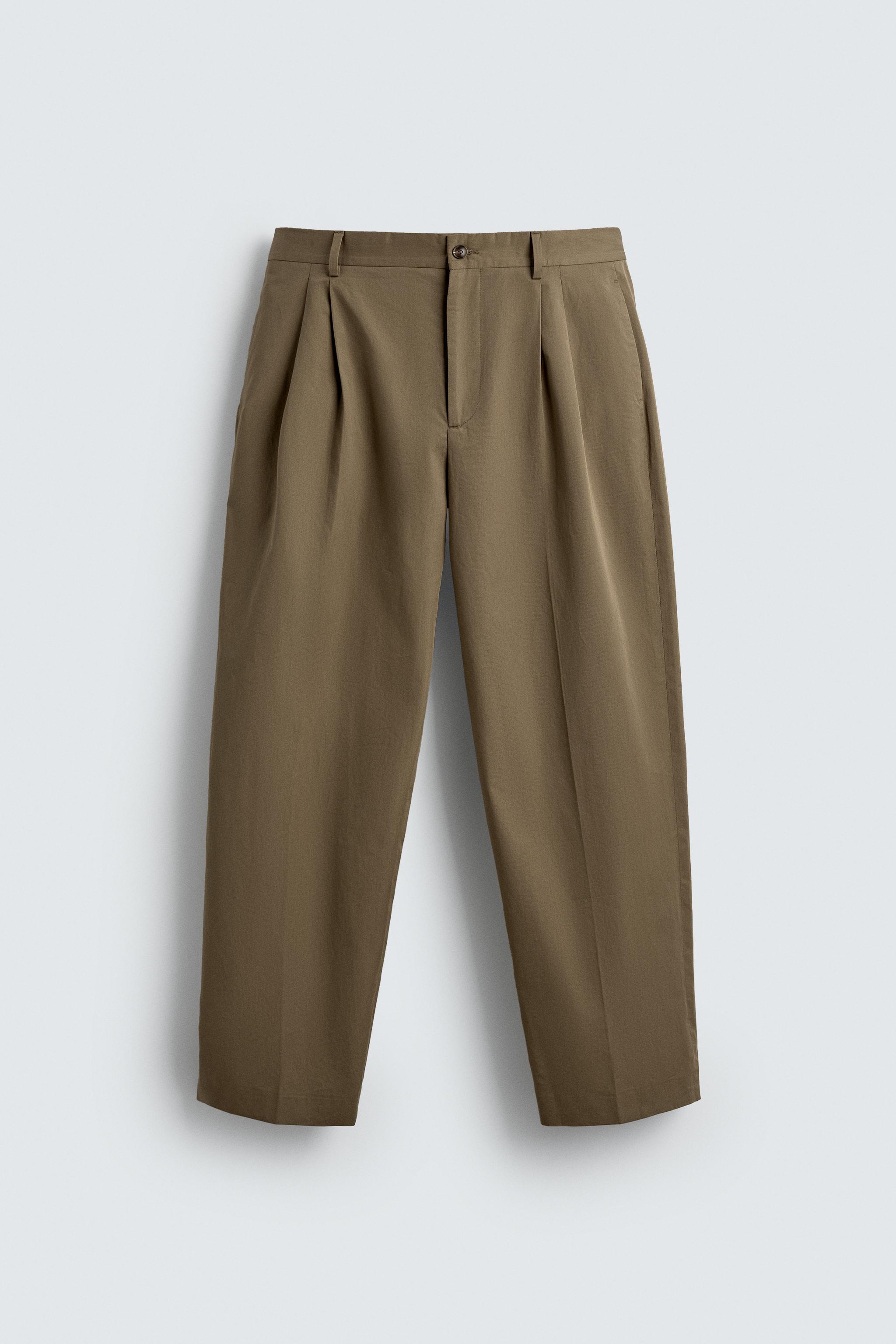 LIMITED EDITION RELAXED FIT PLEATED PANTS