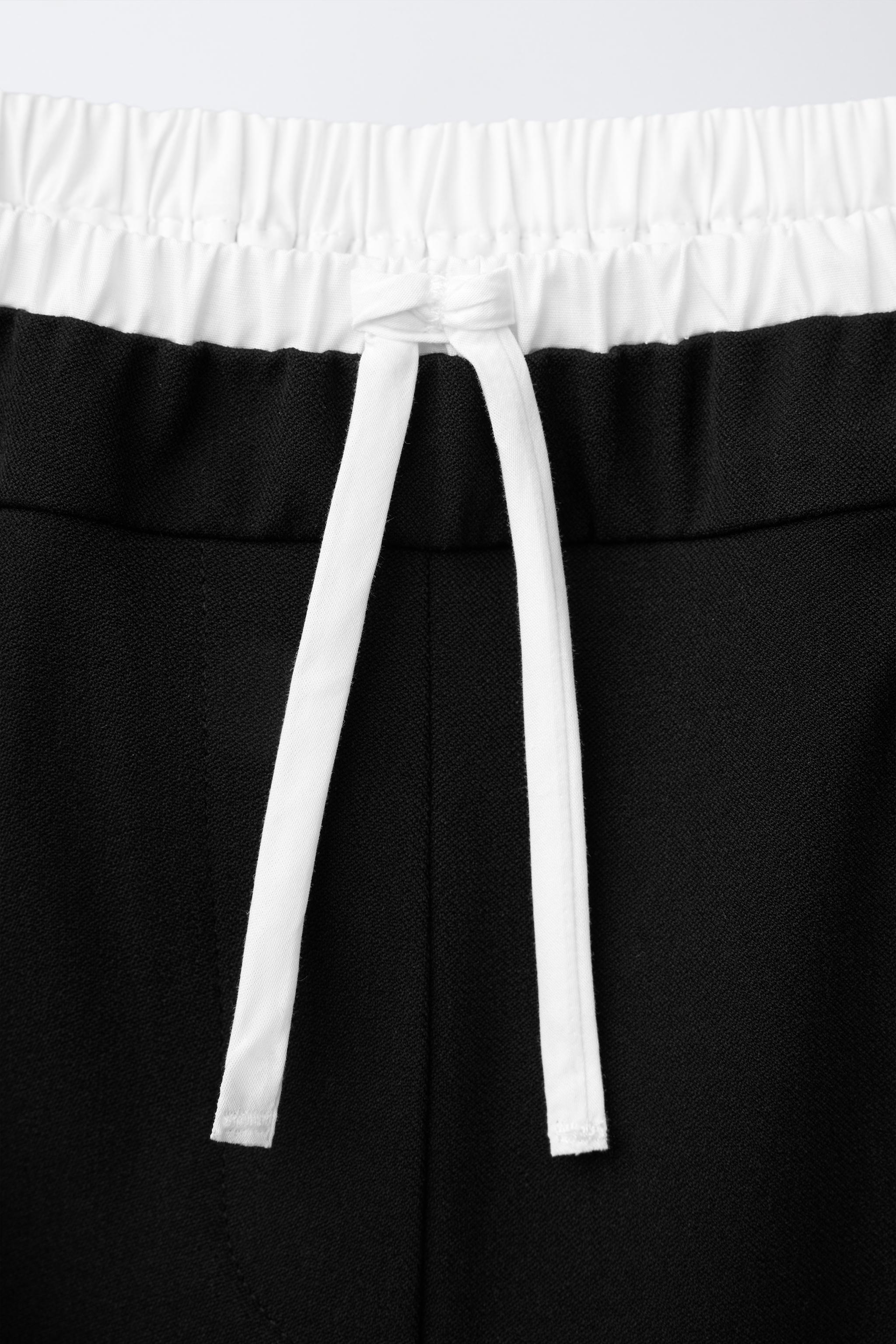 WIDE LEG DOUBLE WAISTBAND PANTS